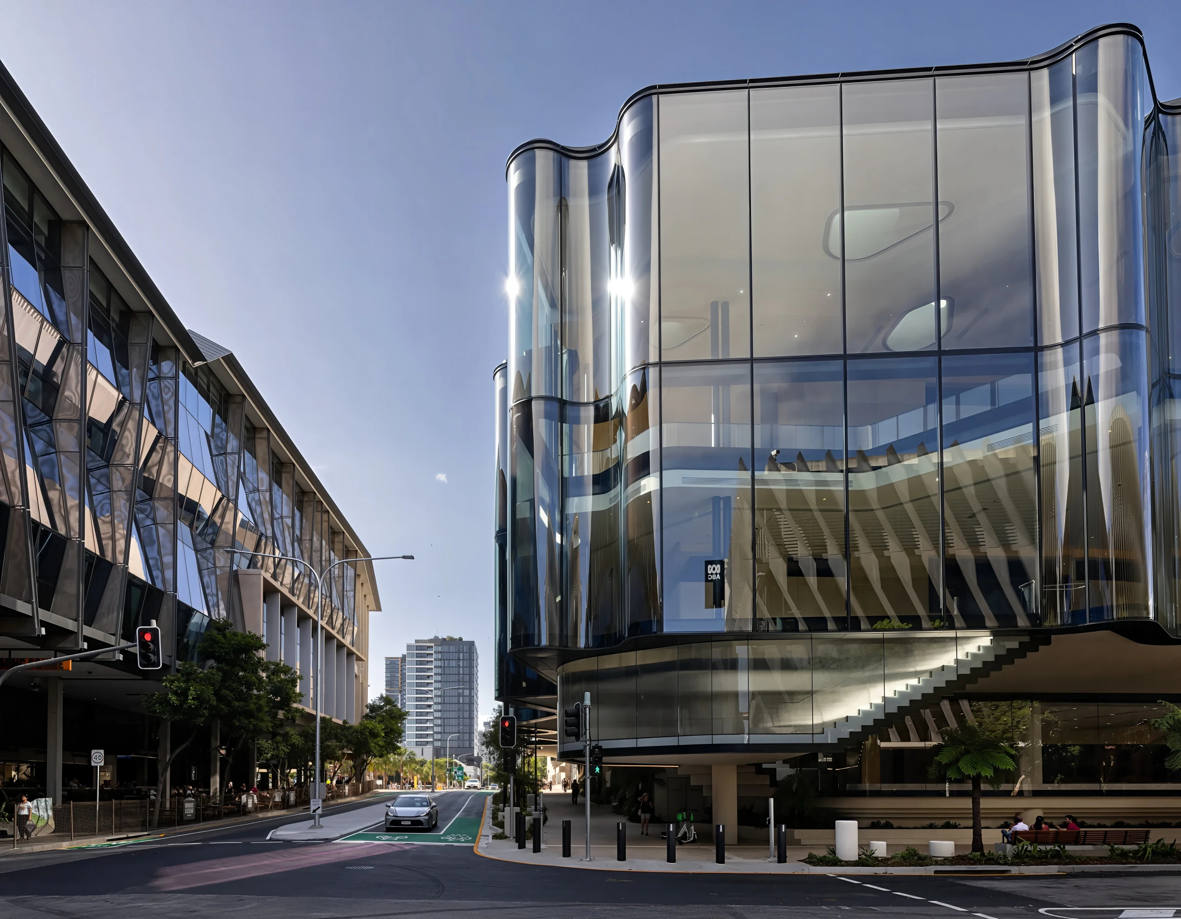 The Glasshouse Theatre's curved glass façade from the city street corner