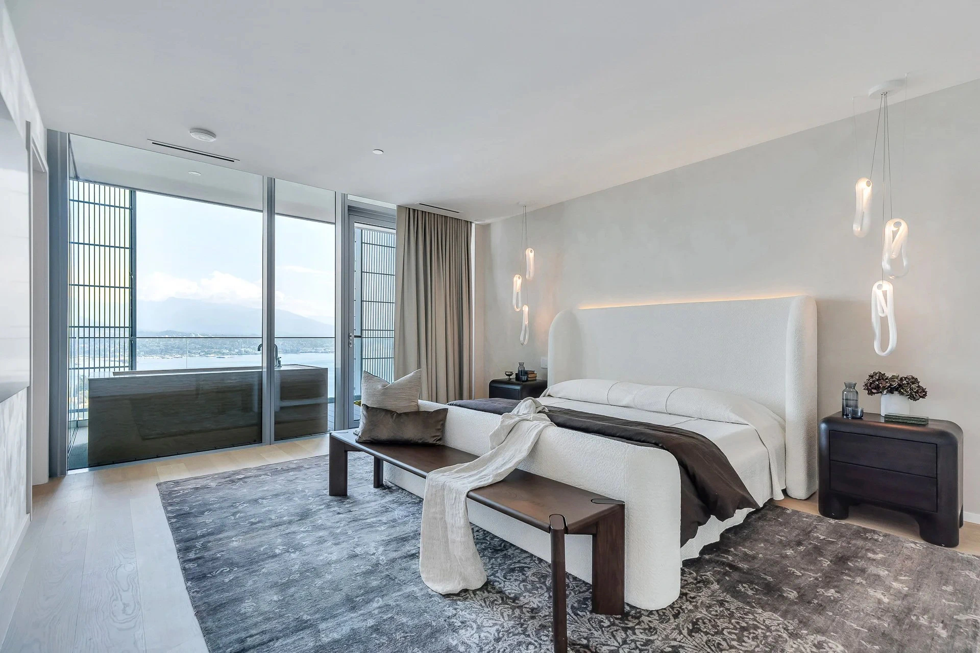 Penthouse 1 with large bed and ocean view balcony