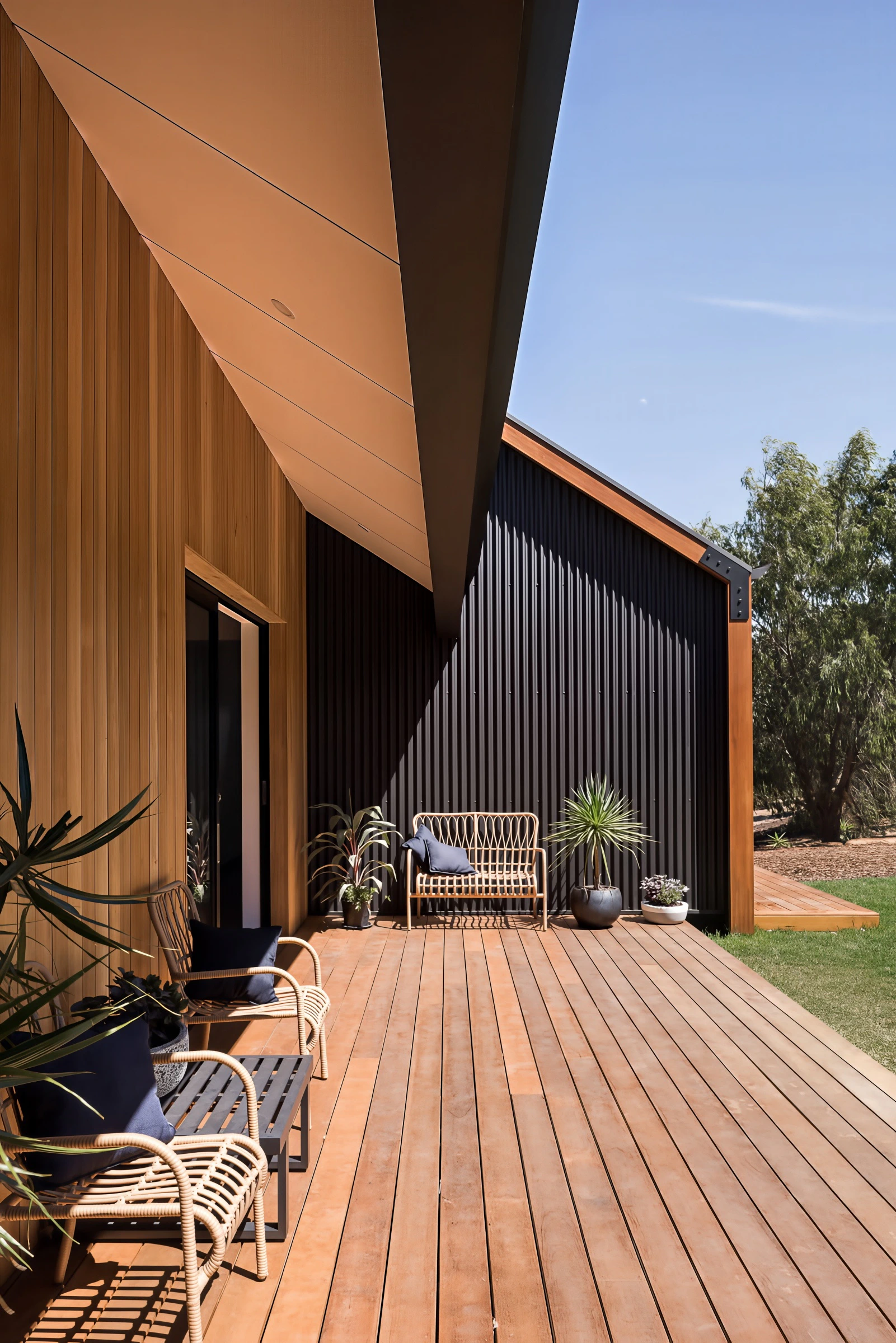 The timber decking continues the organic language of the interior