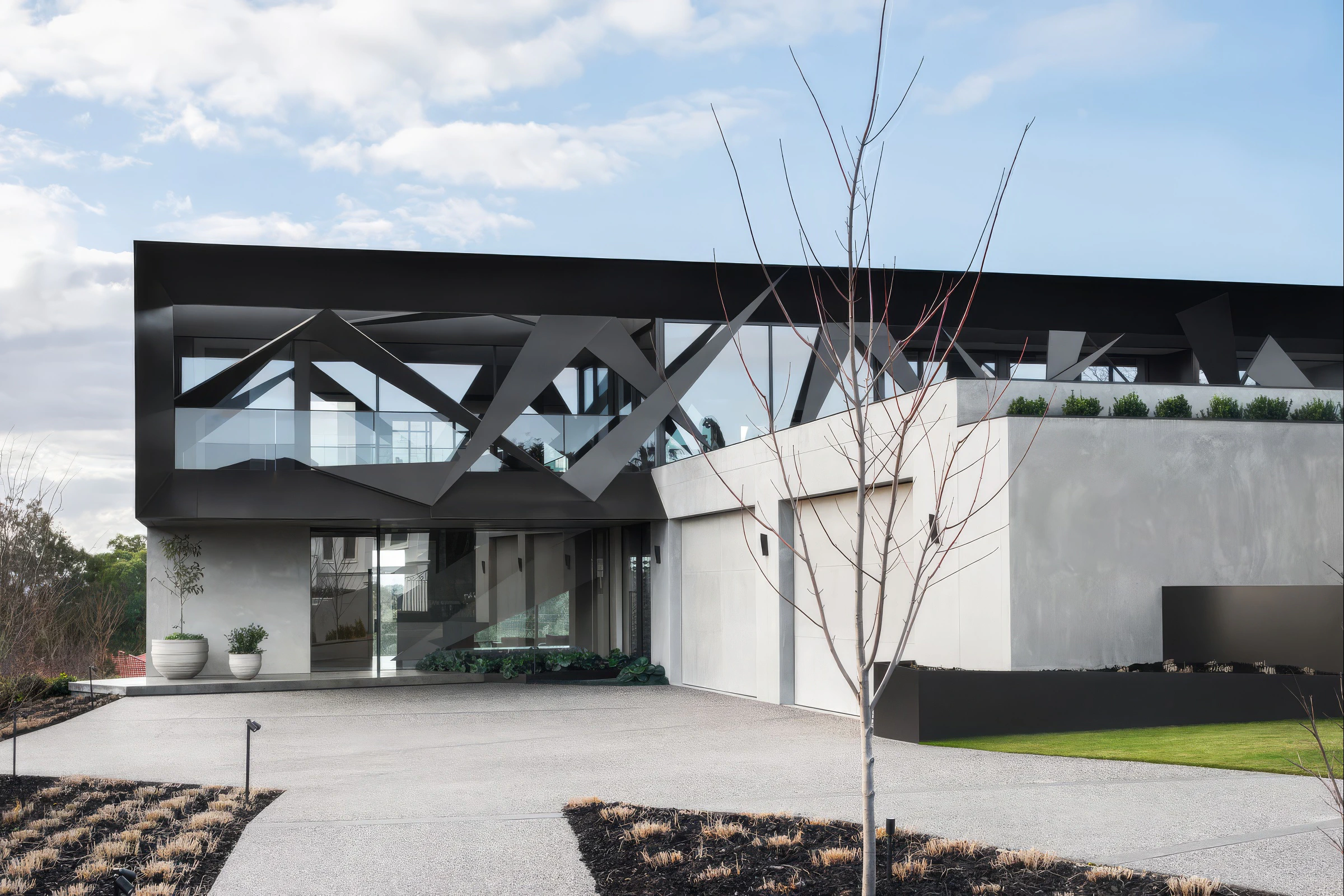 Two-storey house facade, geometric black upper level and glass balcony