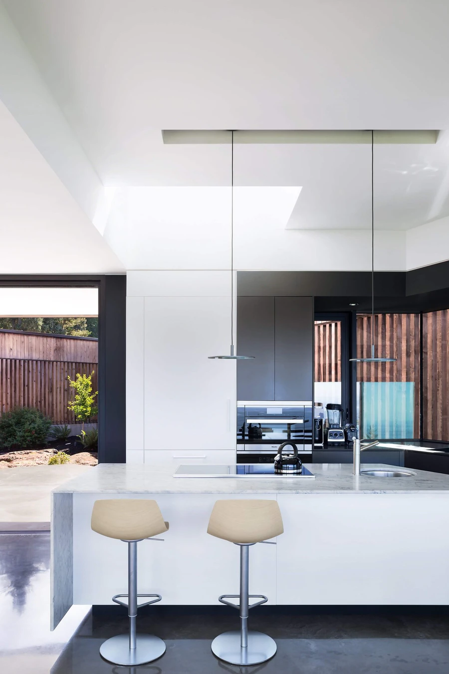 Modern kitchen interior with minimalist design and natural light