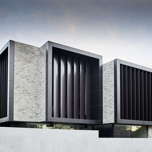 Hawksburn Residence with vertical louvered windows