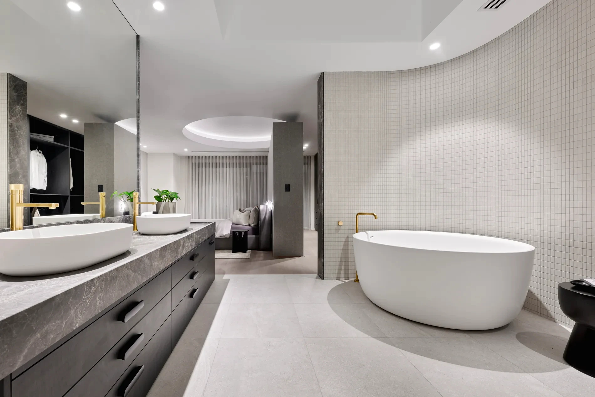 Modern bathroom with free-standing bathtub and double vanity sinks