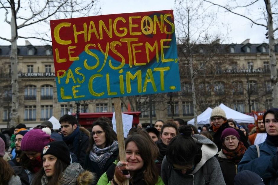 Capitalism incompatible with climate action, survey suggests