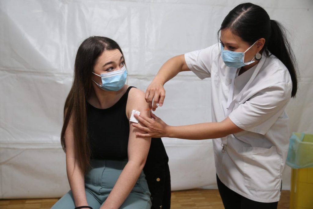 Combining flu and Covid vaccines possible, but caution advised for youth