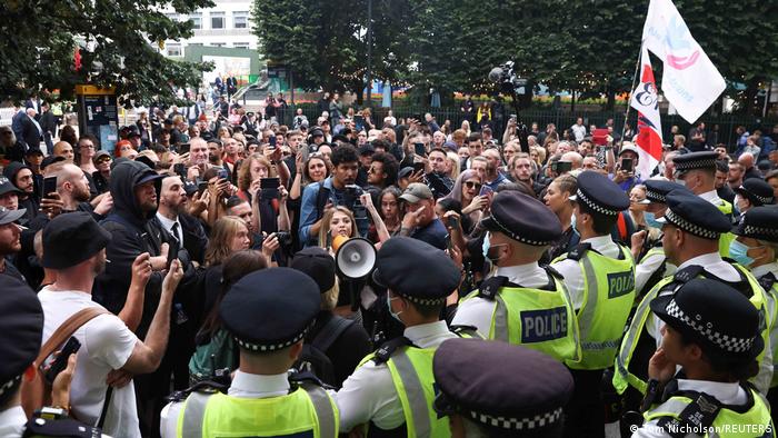 Four police officers injured during anti-vaccination demonstration in London