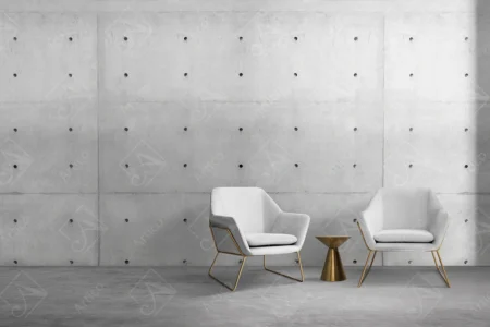 Articoo - Interior design of a room with a concrete wall, white chairs and a small golden table - Articoo_359356