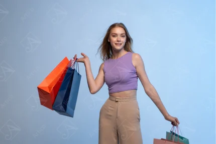 Happy Young Woman Holding Colorful Shopping Bags Art