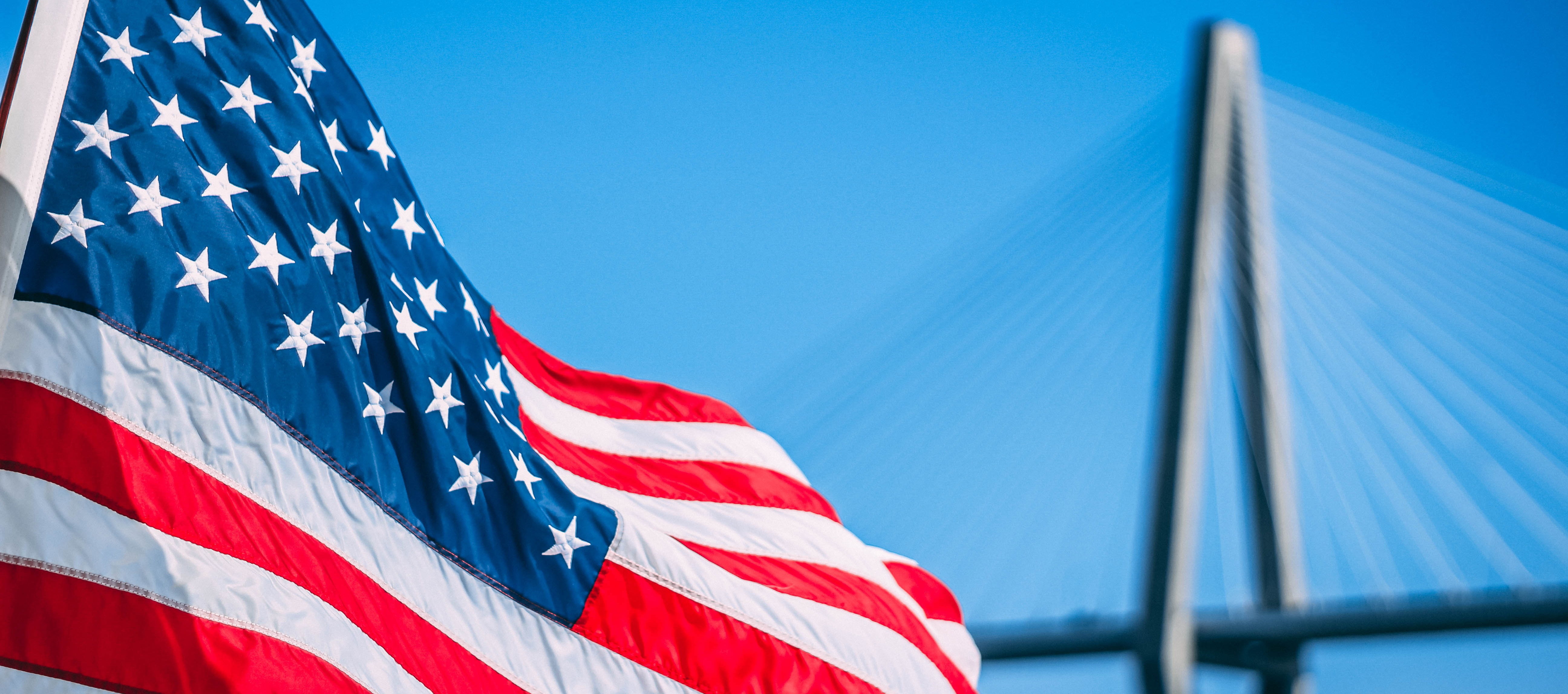 American Flag flying below the Arthur Ravenel Jr. Bridge Charleston, South Carolina