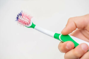frayed toothbrush from brushing too hard