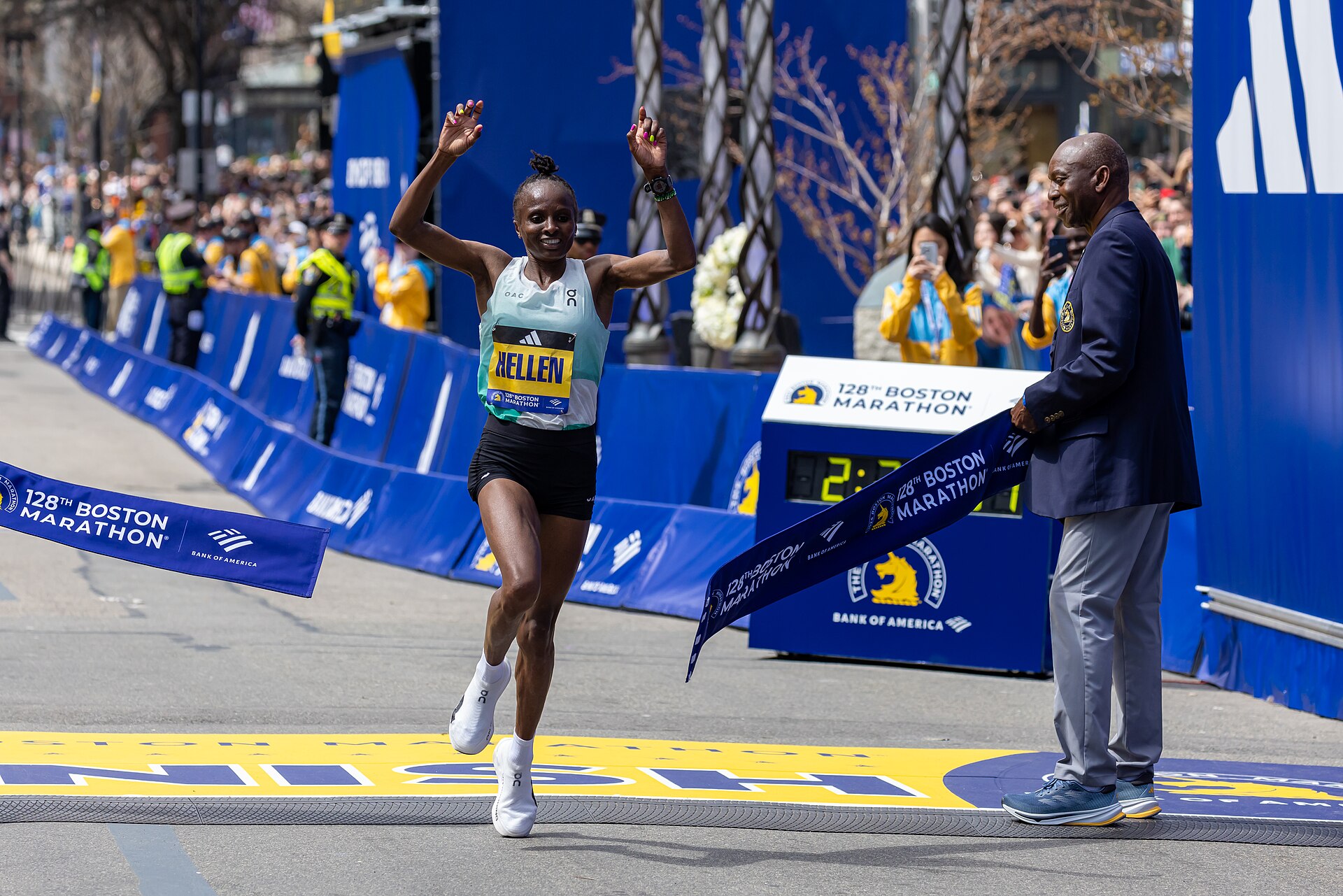 Hellen Obiri breaking the tape to win the 2024 Boston Marathon