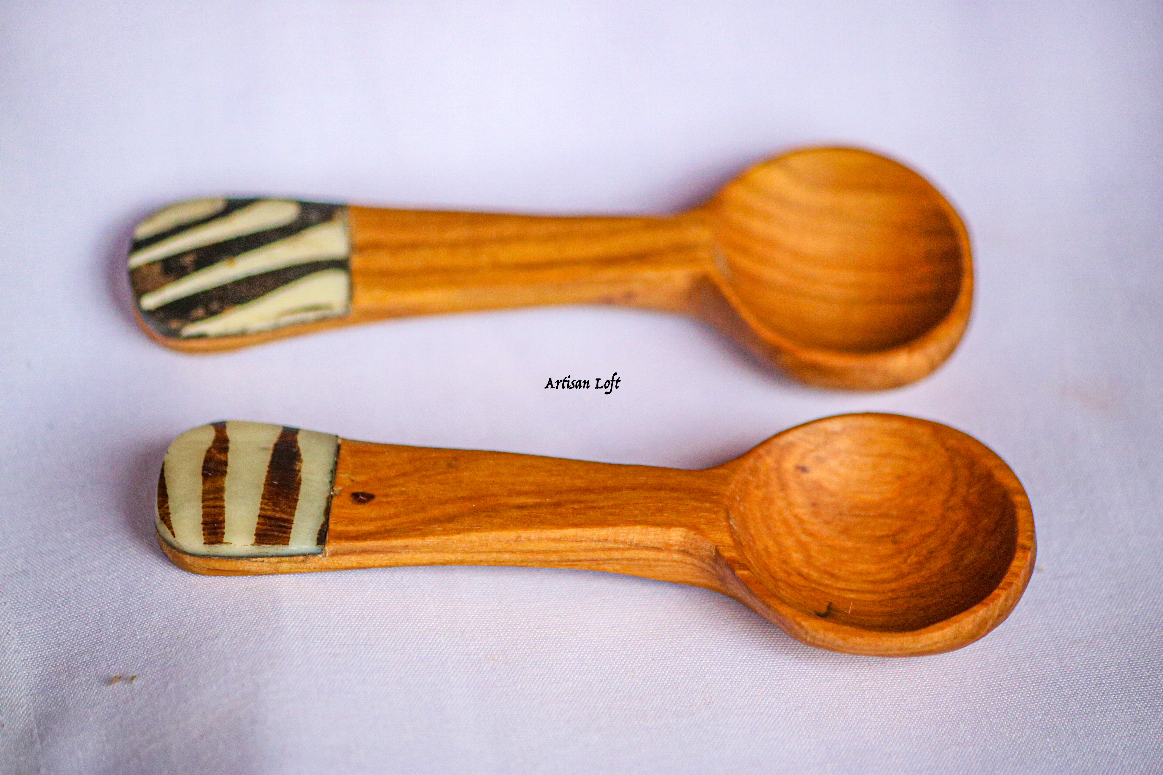 Two small wooden spoons