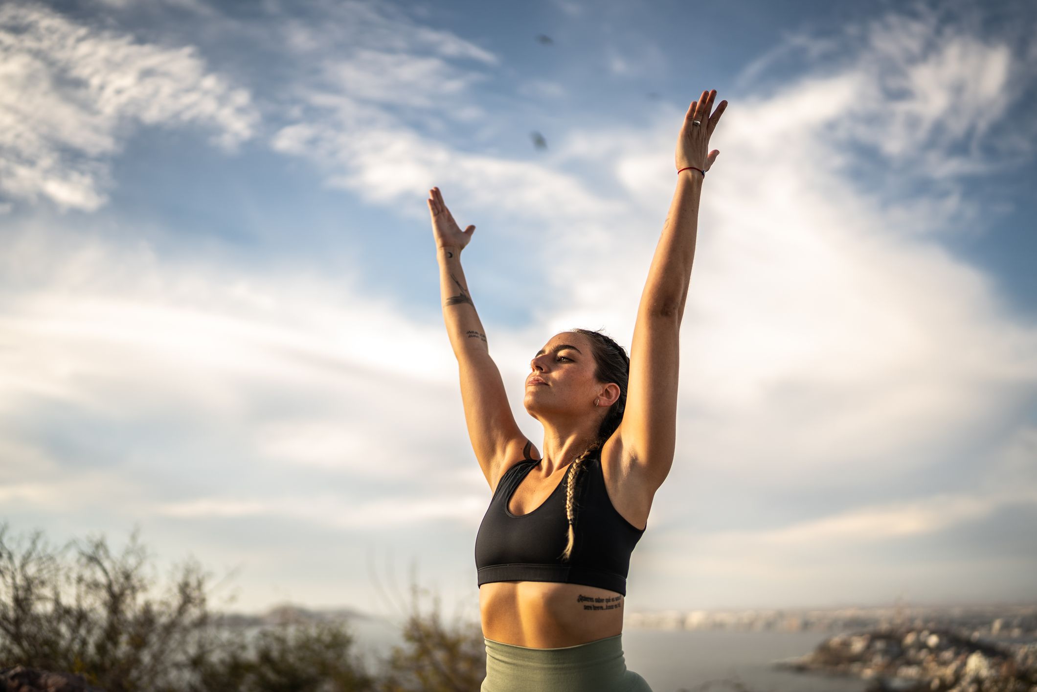 Raised arms pose