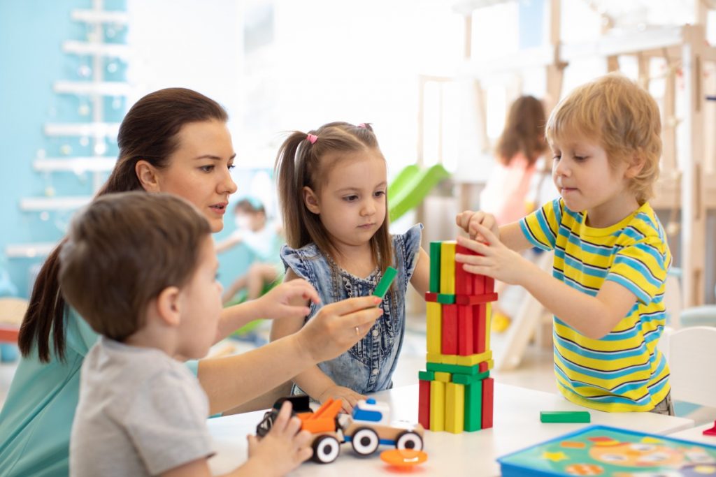 preschooler development playing with blocks