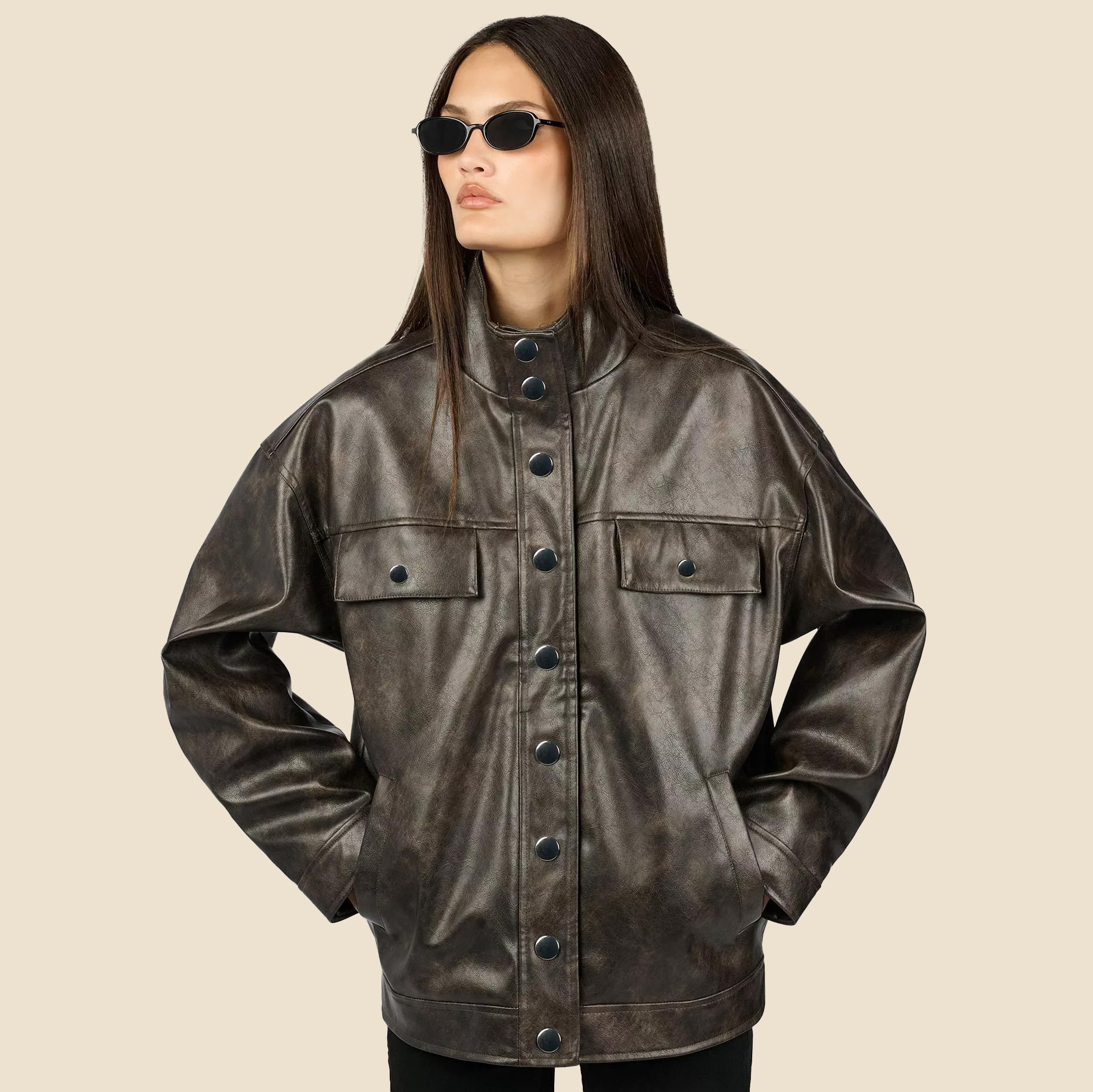 Woman in '90s leather jacket