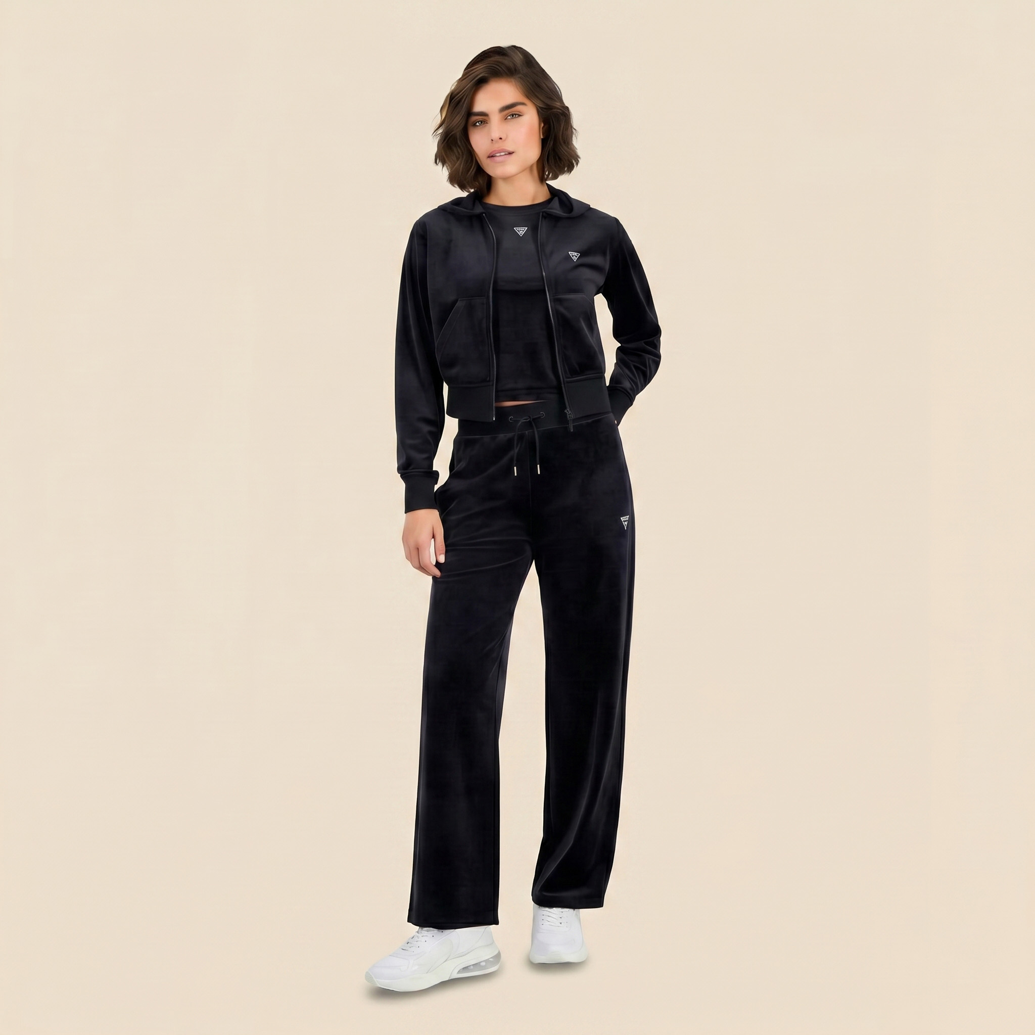 Woman in '90s velour tracksuit