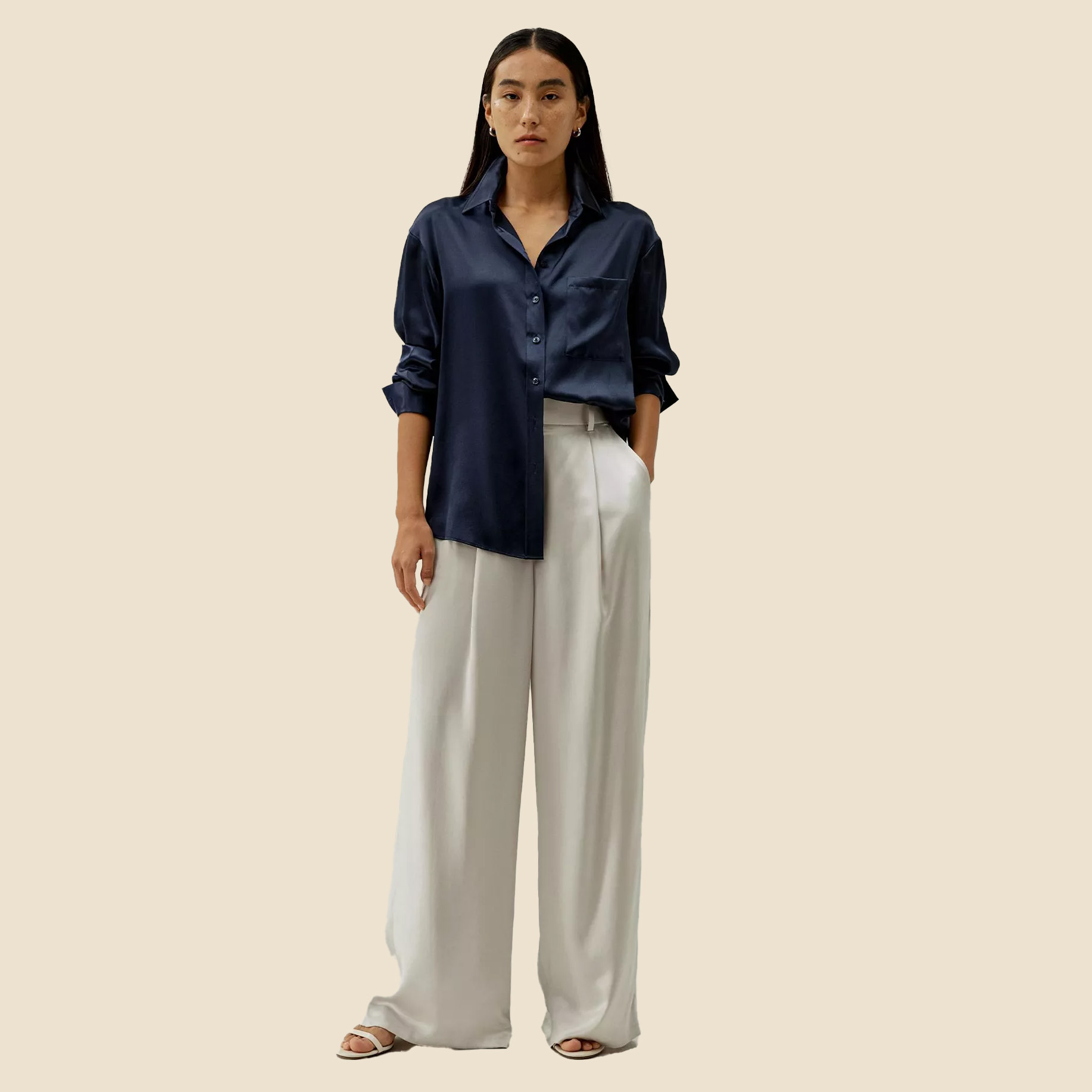 Woman in '90s oversized silk button down