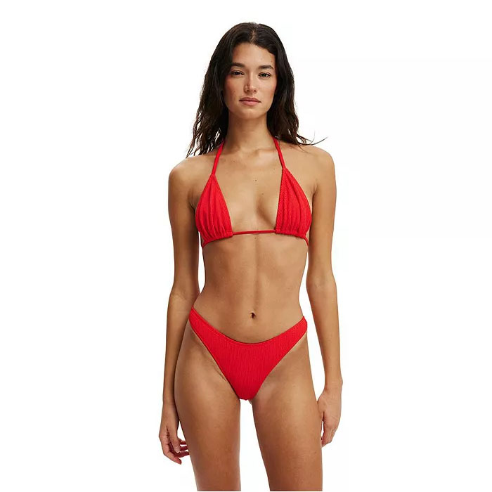 Woman in COTTON ON Triangle Bikini in Red