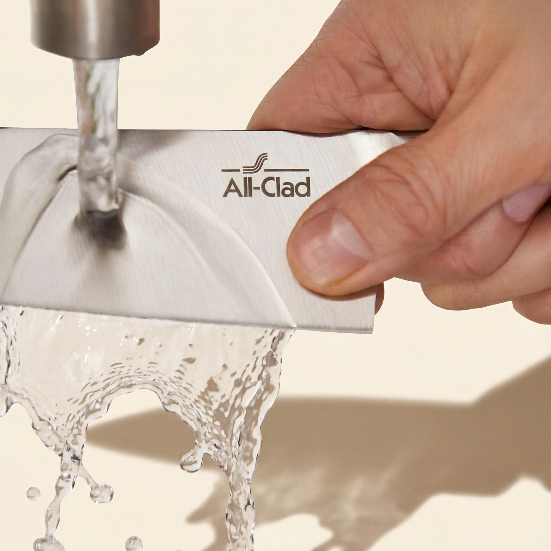 Man handwashing knife