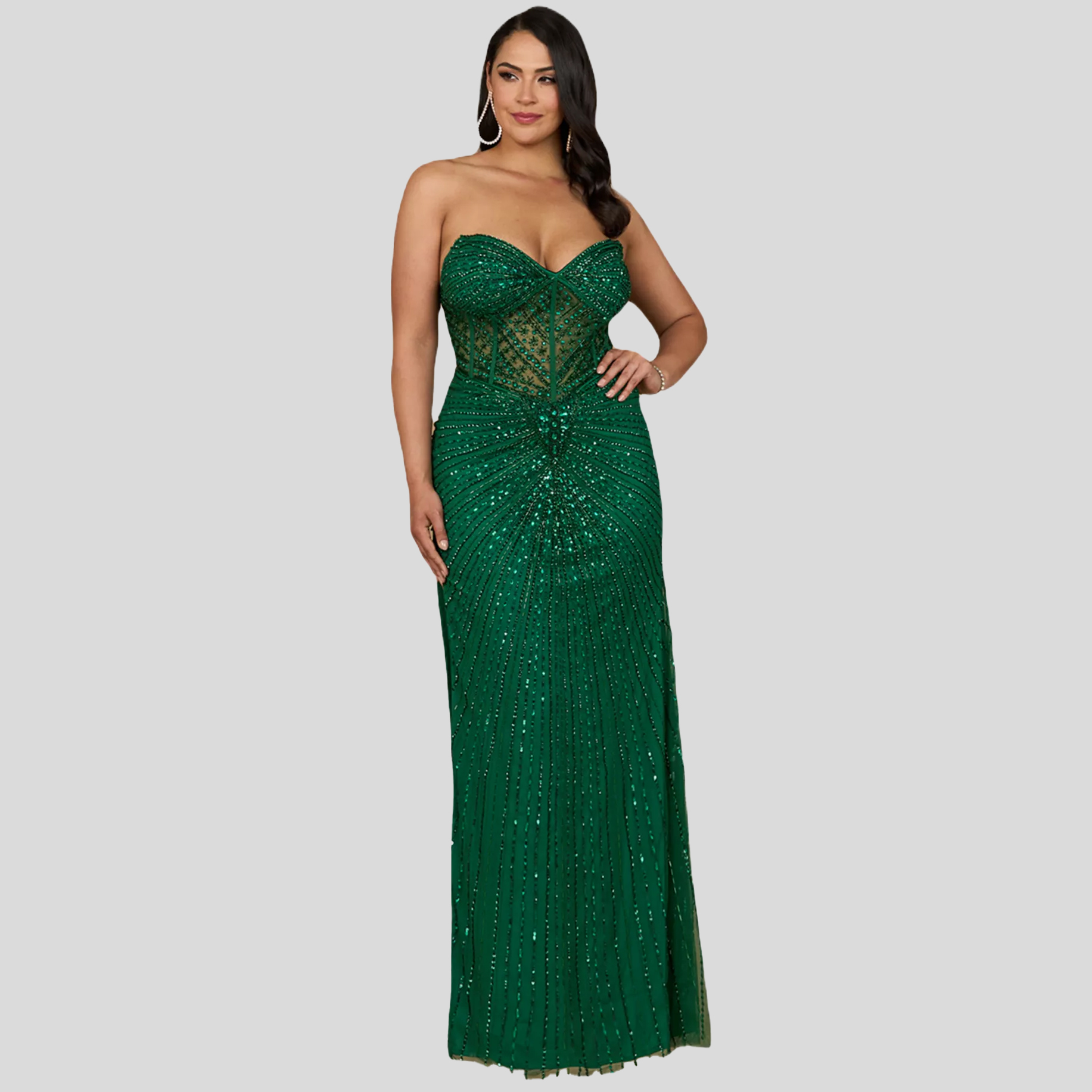 Woman in green sequin gown