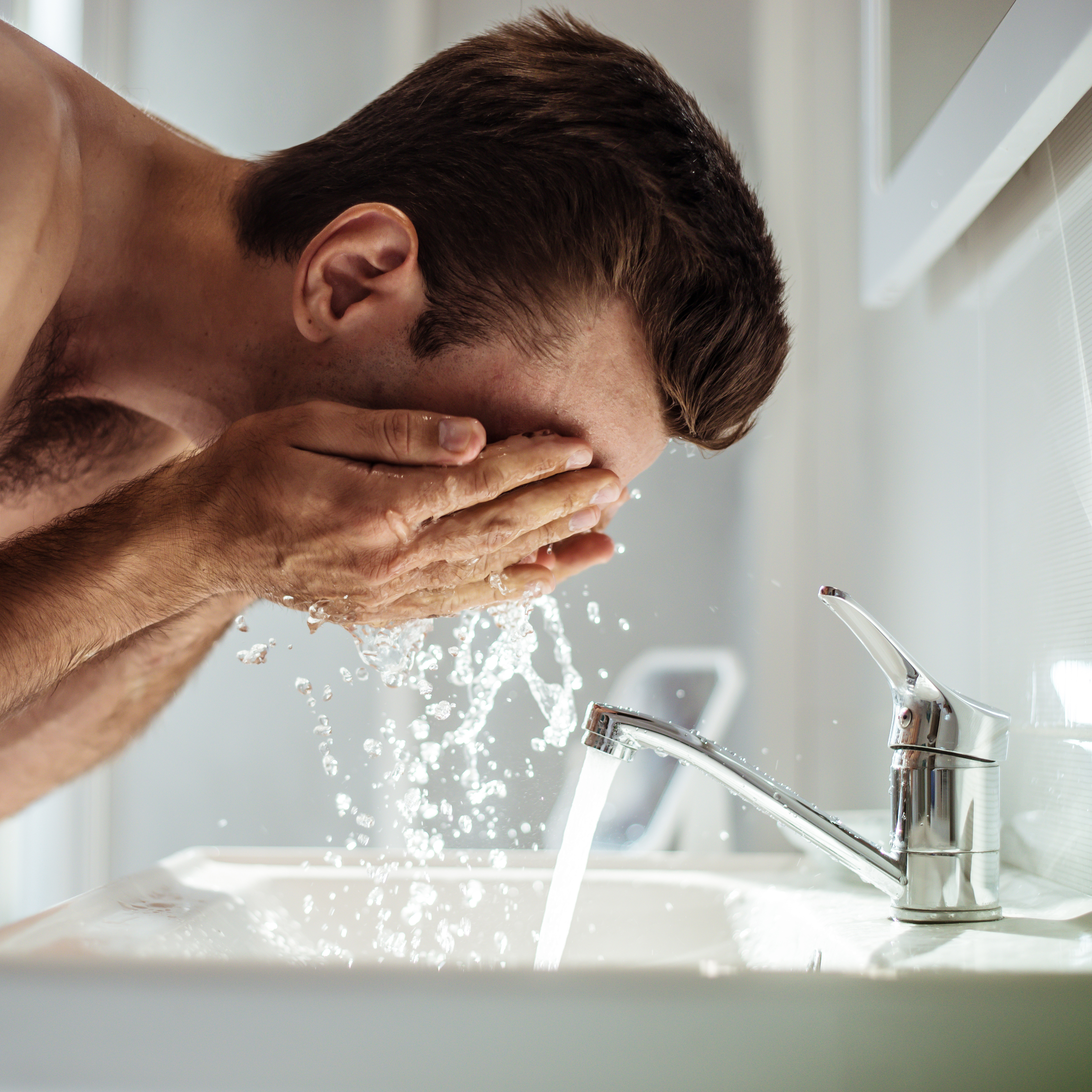 Man Washing Face