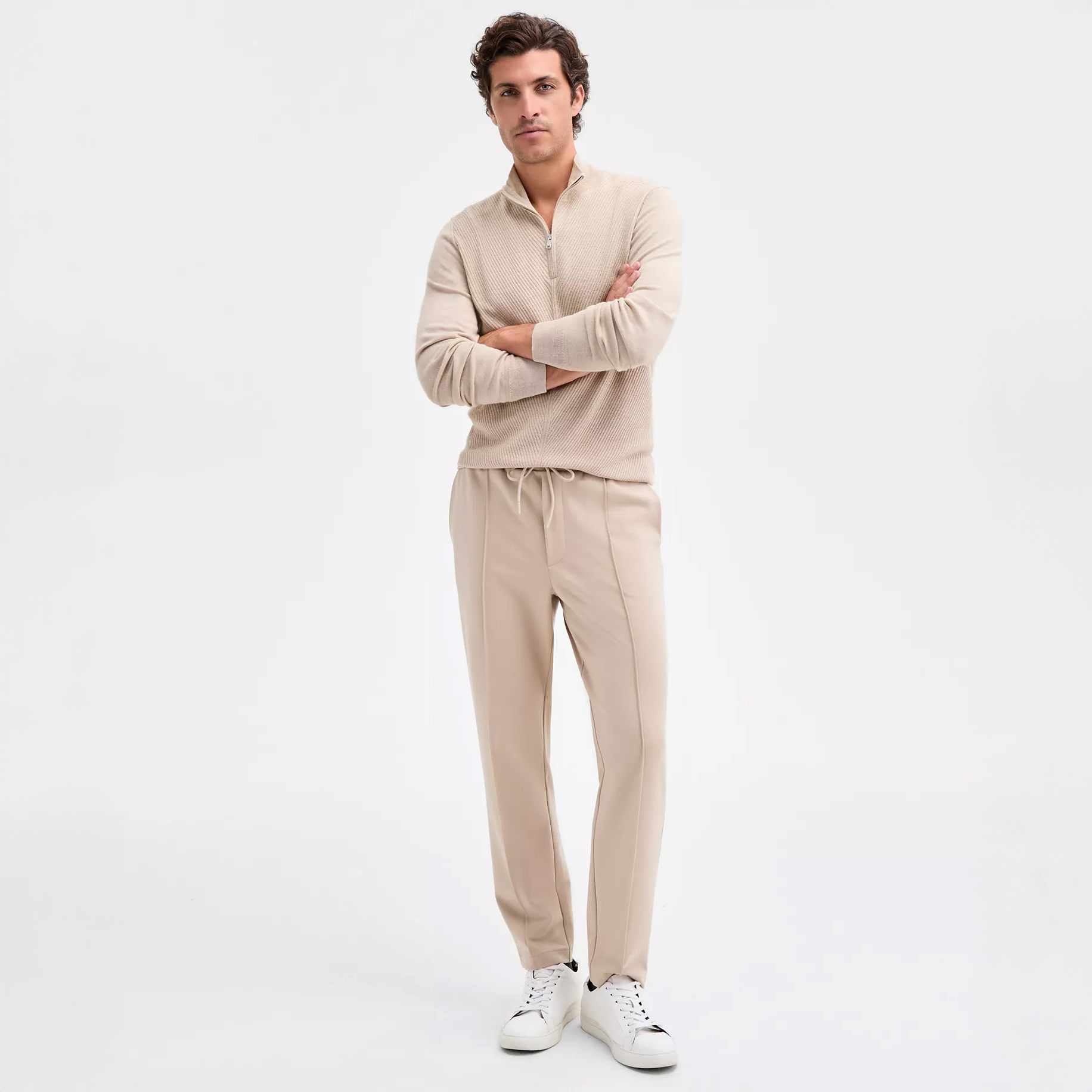 Man in long-sleeve quarter-zip sweater
