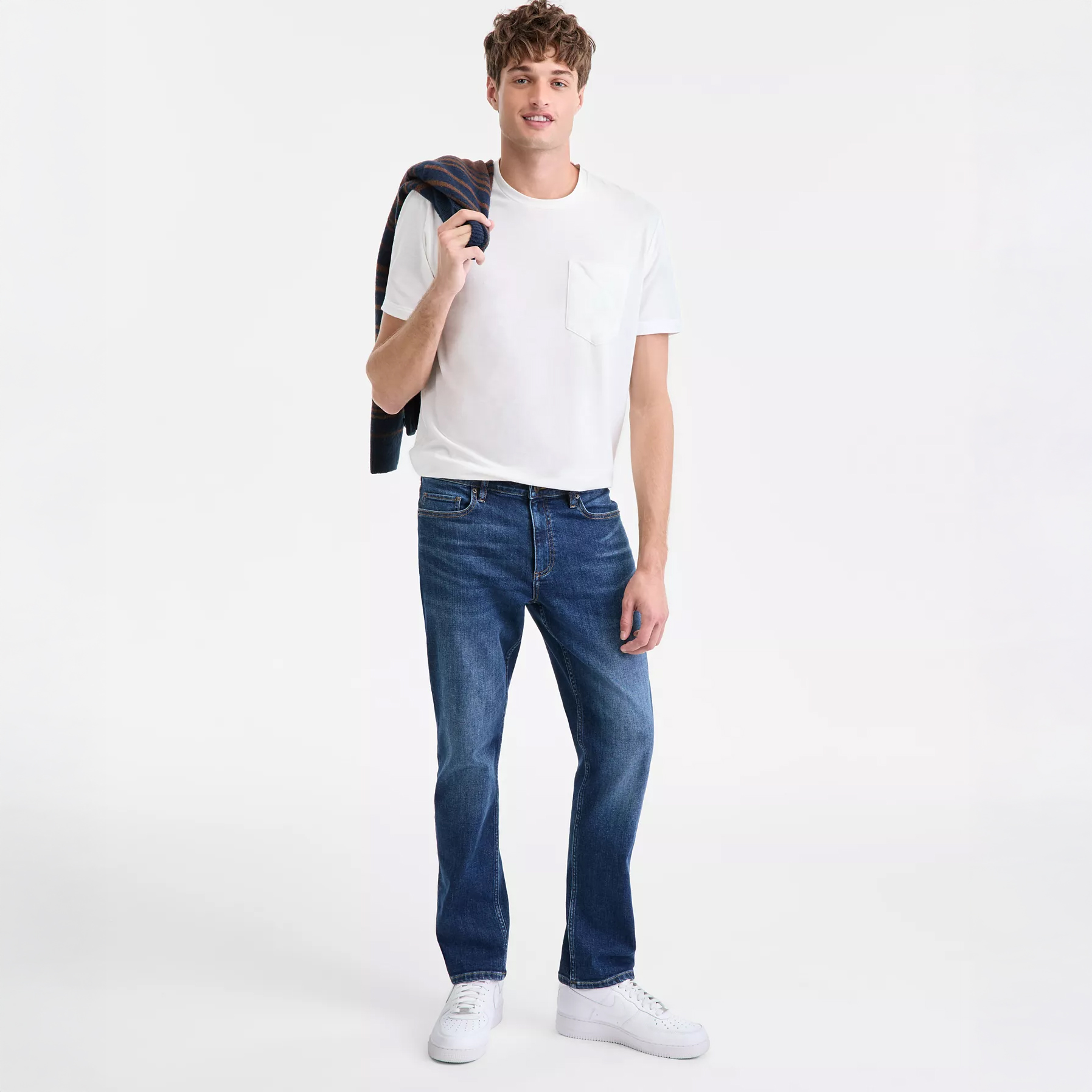 Man in dark wash denim