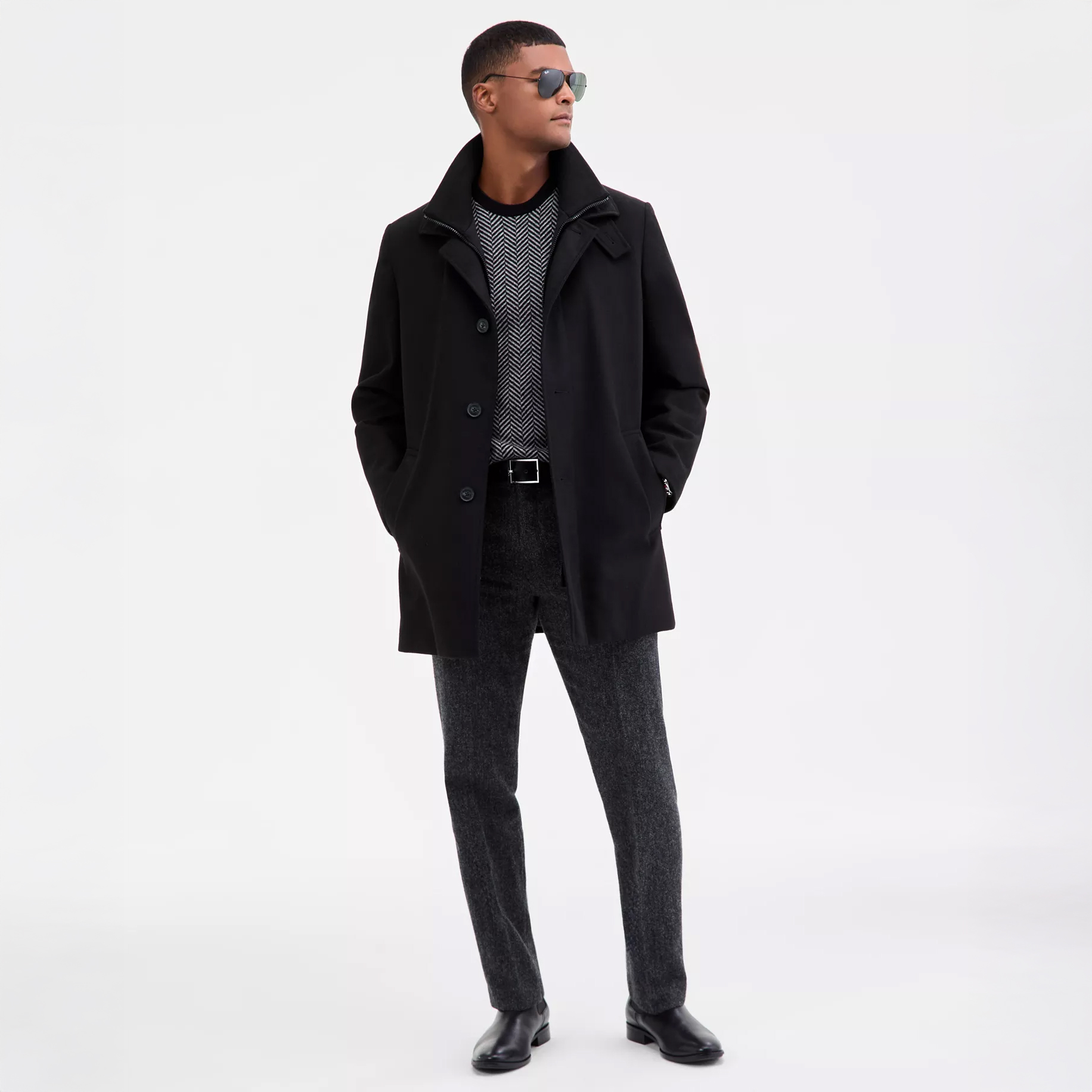 Man in black overcoat