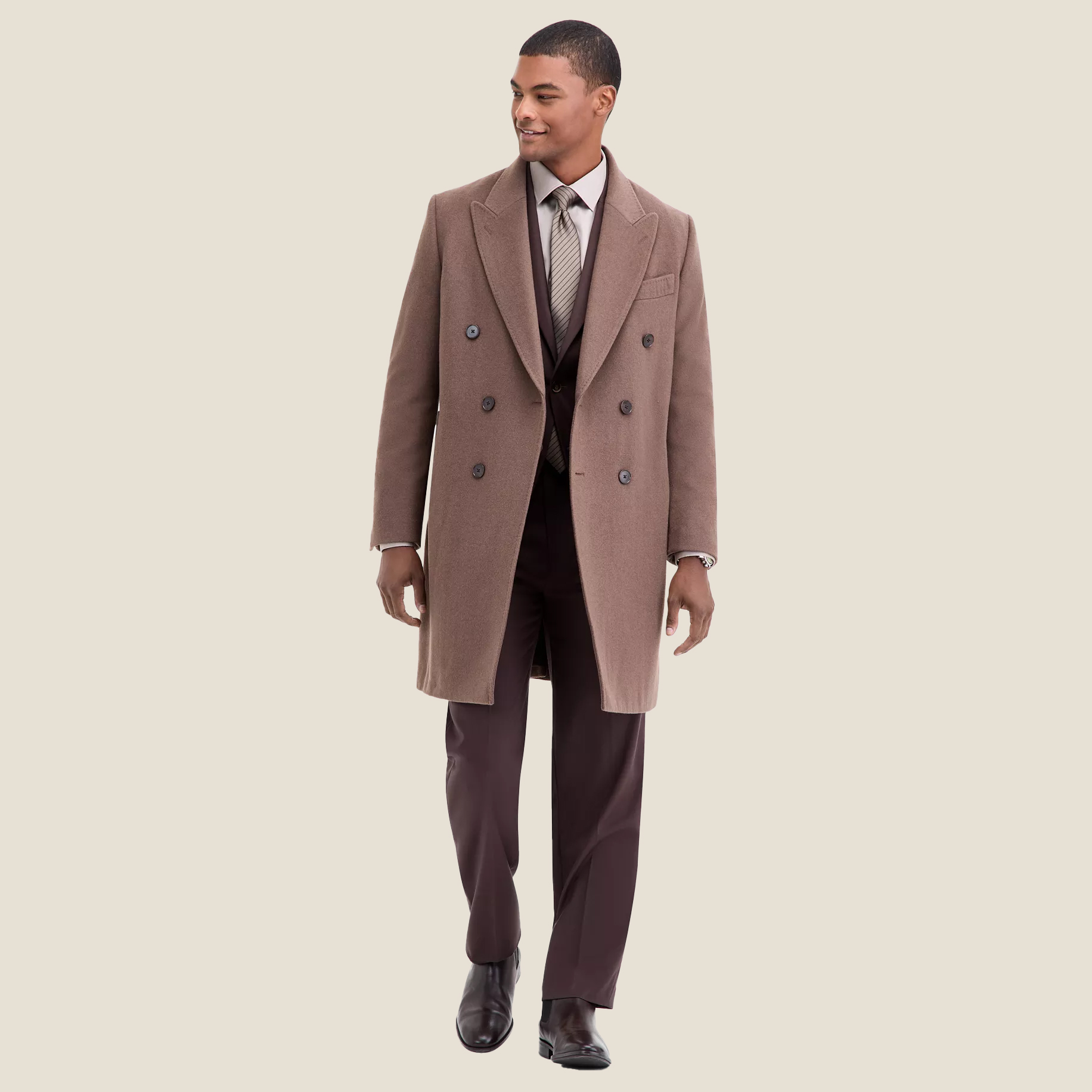 Man in light brown overcoat