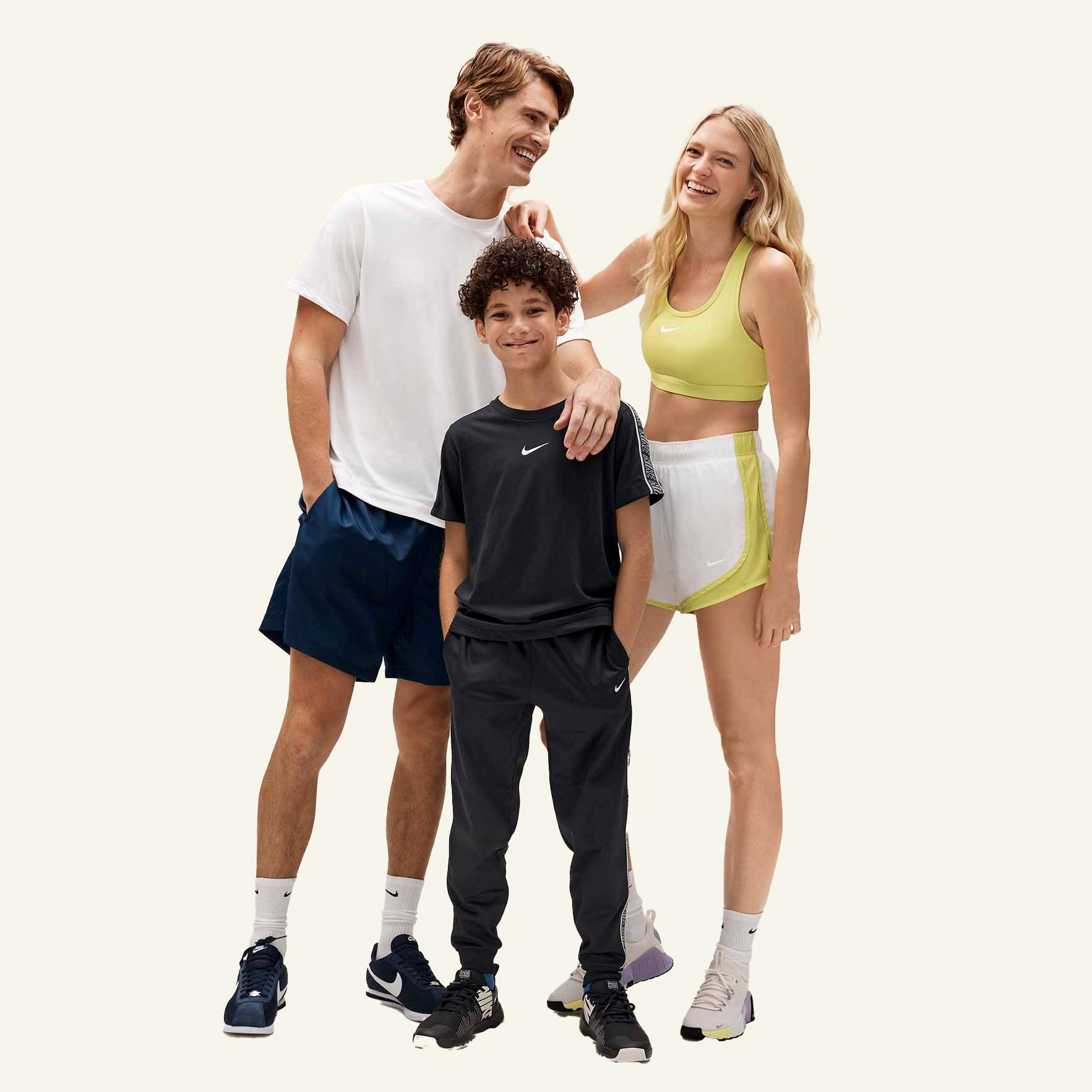 Man, woman and child in activewear