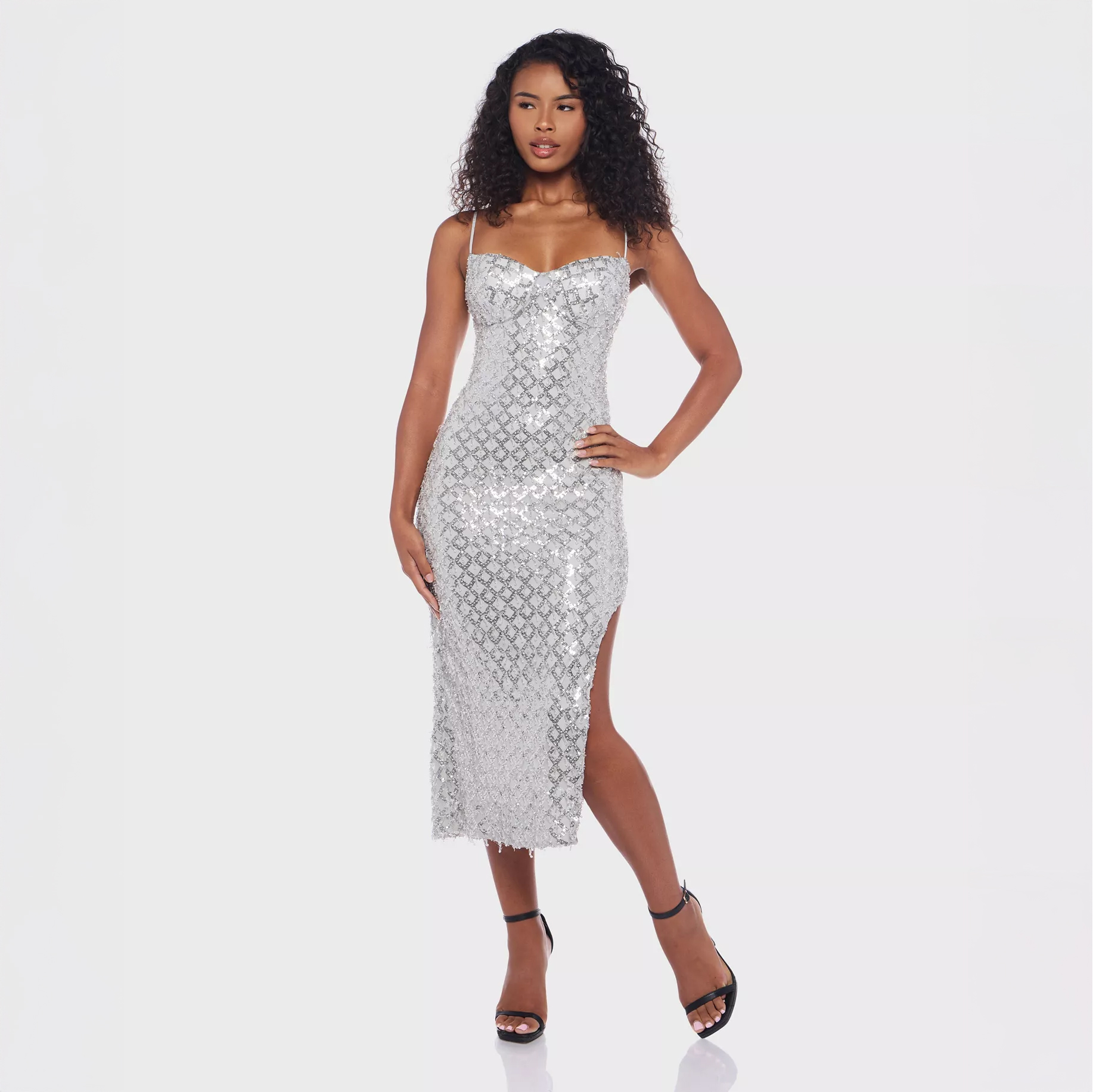 Woman in silver sequin dress