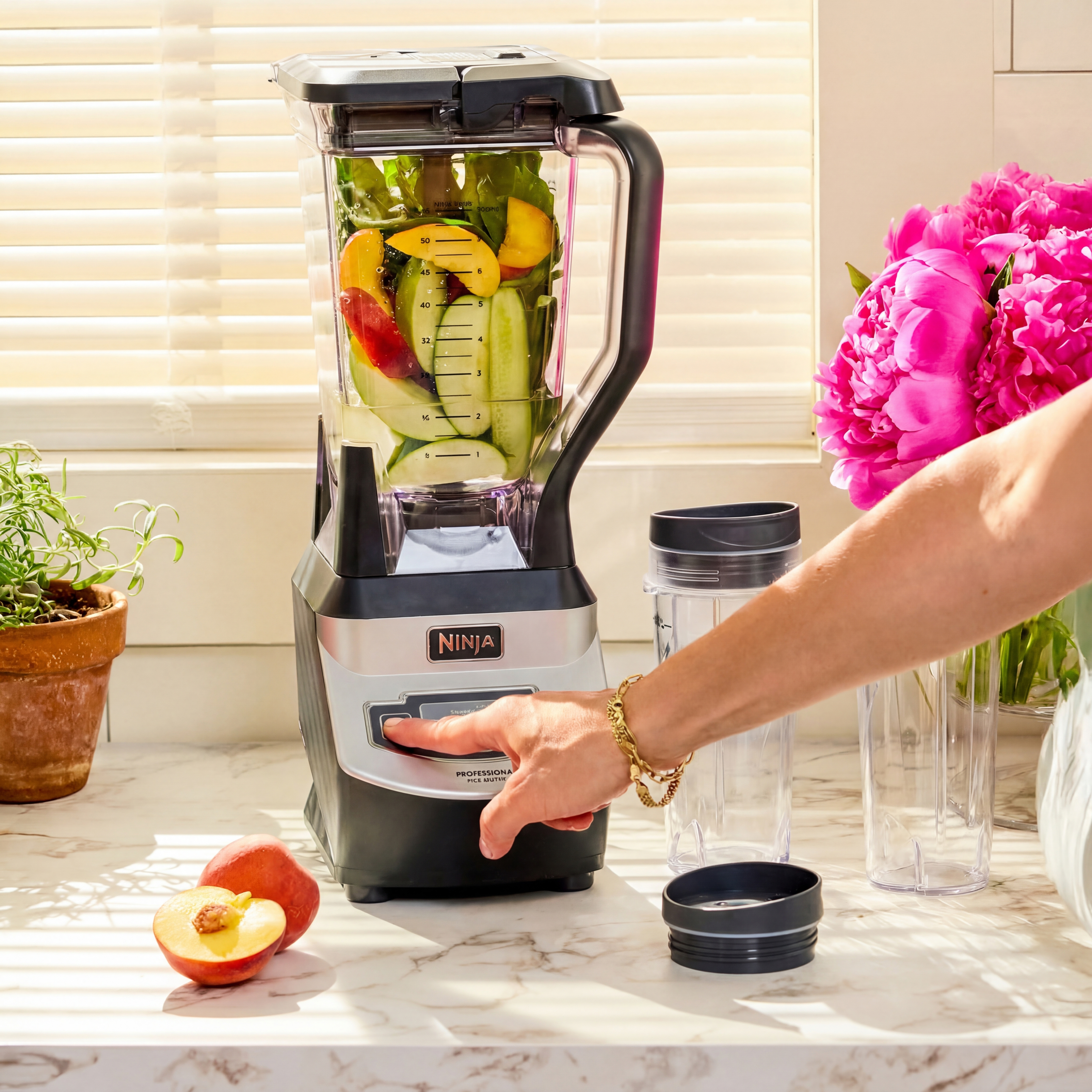 Blender with fruits and veggies