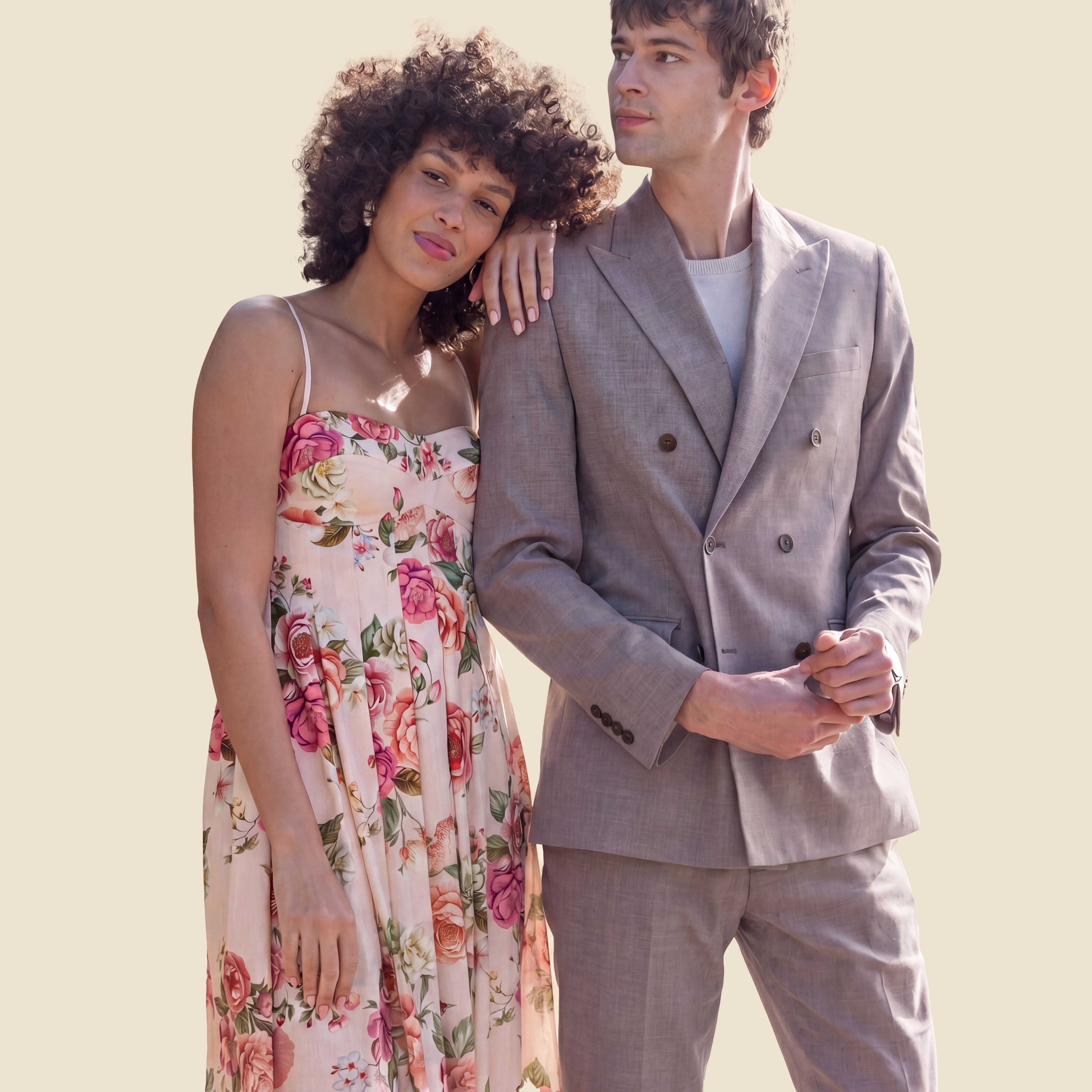 Woman and man in spring wedding guest attire