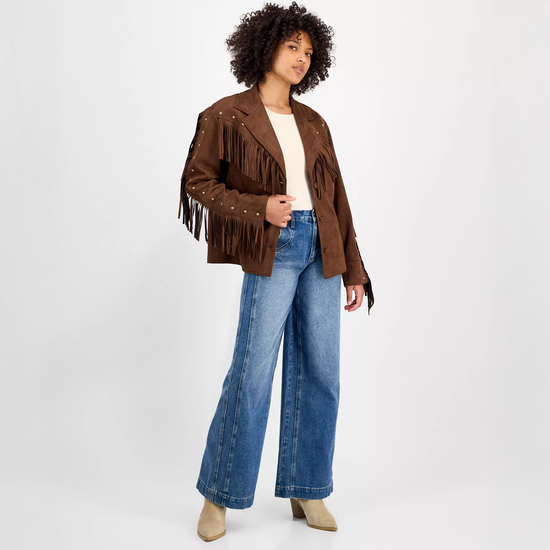 Woman in brown suede fringe jacket