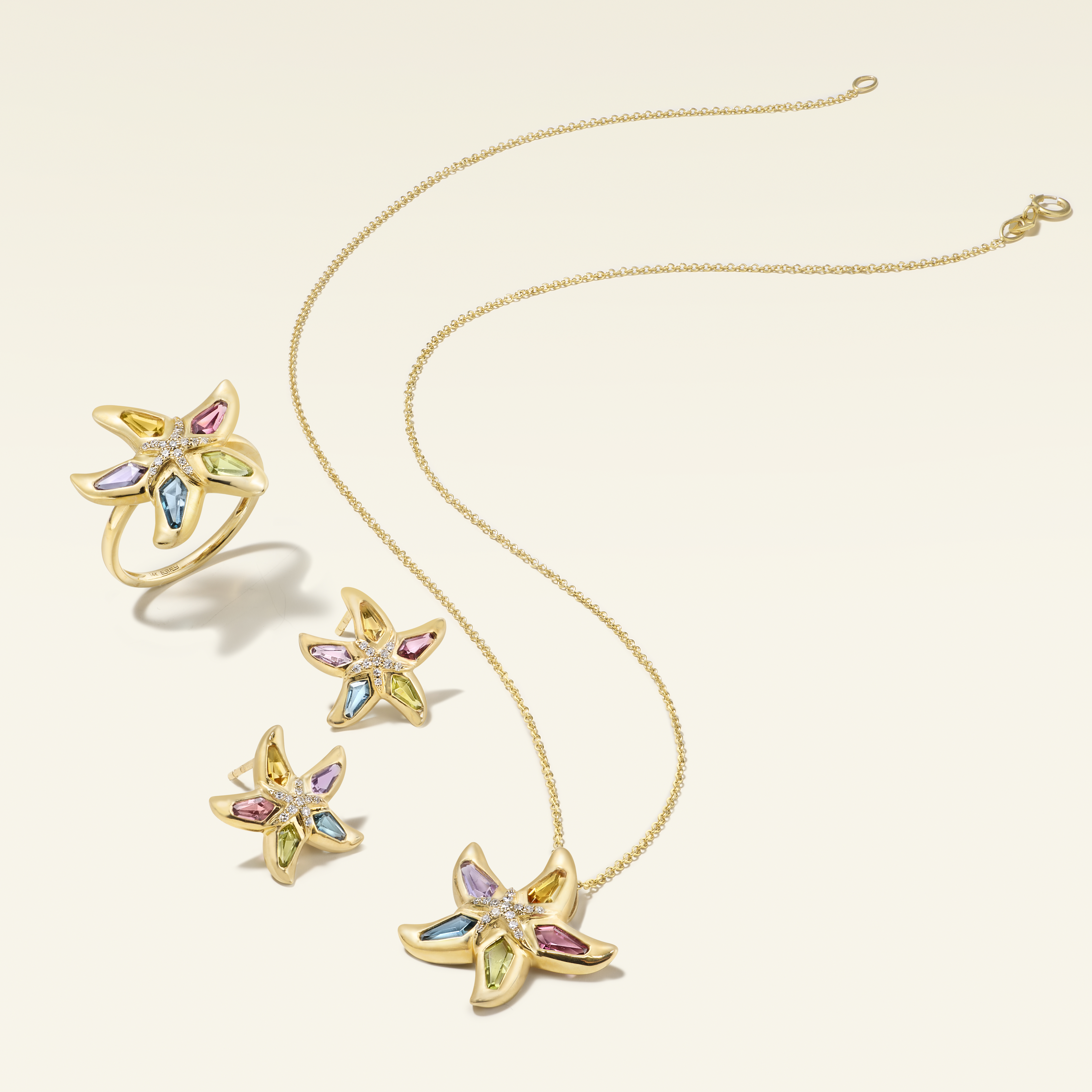 Starfish gold necklace, earrings, and ring