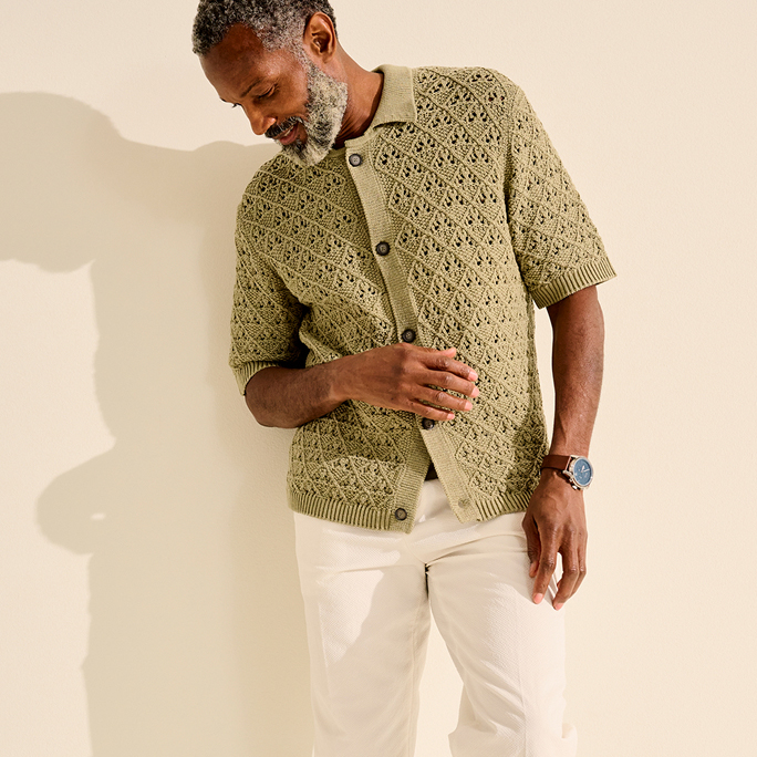 Man in knit shirt and linen pants
