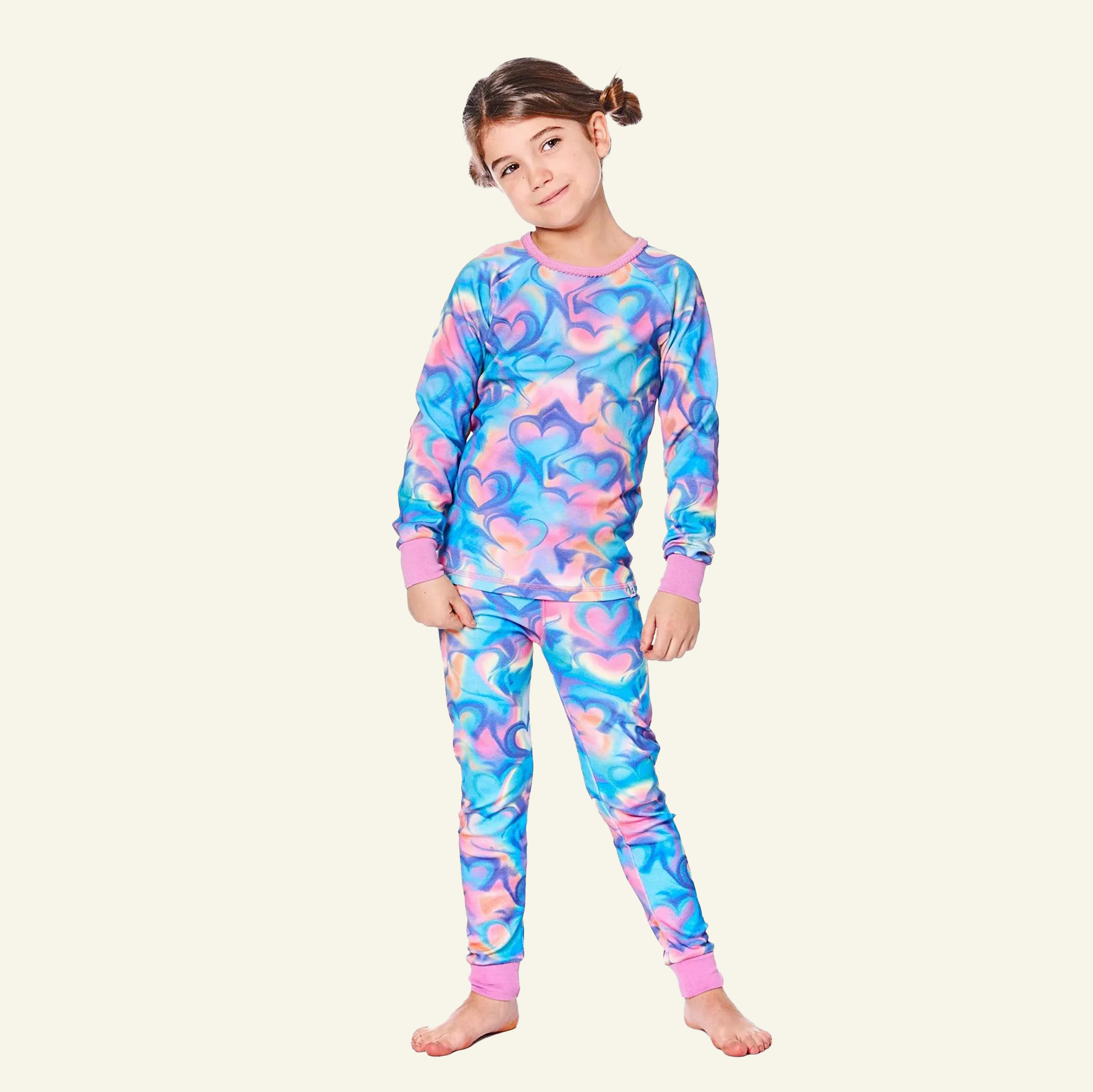 Girl in Valentines day heart pajamas