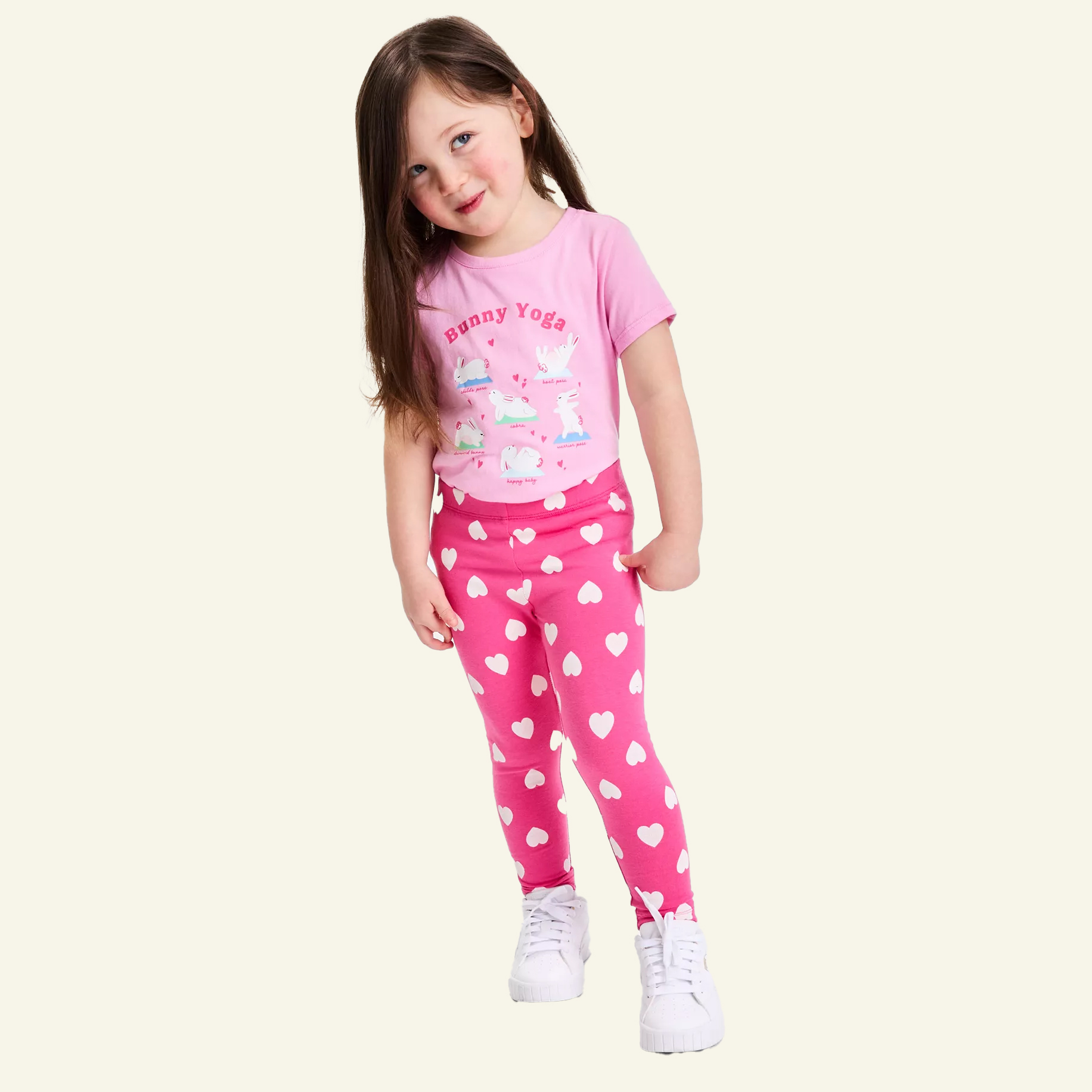 Girl in Valentines day heart print leggings