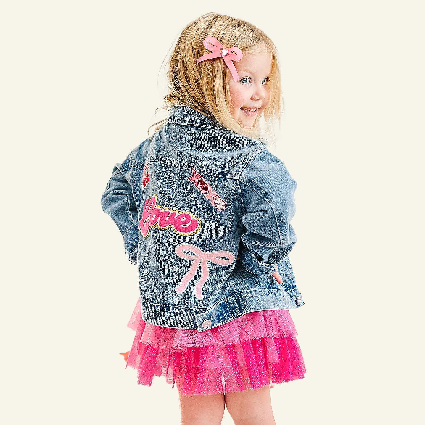 Girl wearing a pink Valentine's day dress