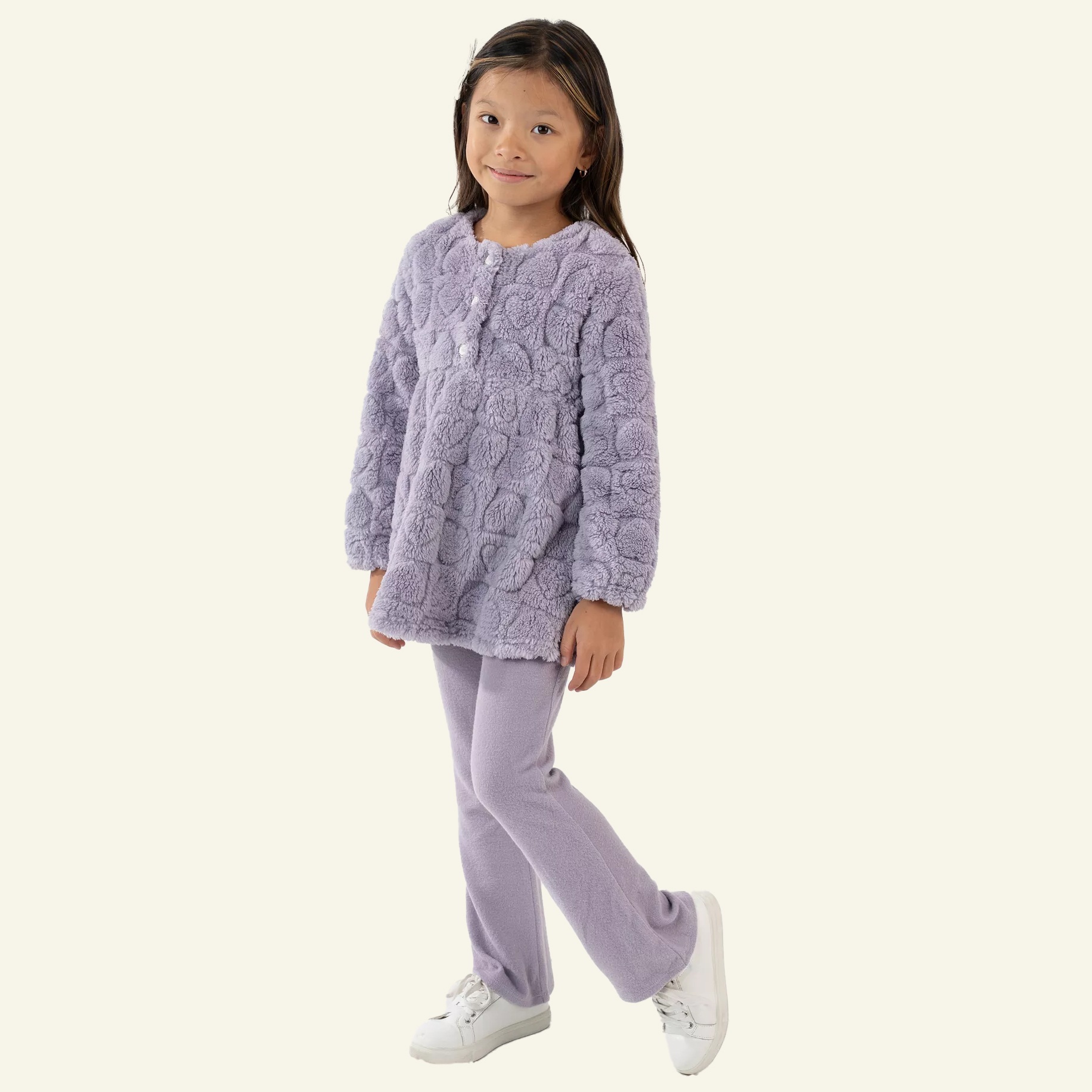 Girl in Valentines day purple heart sweater