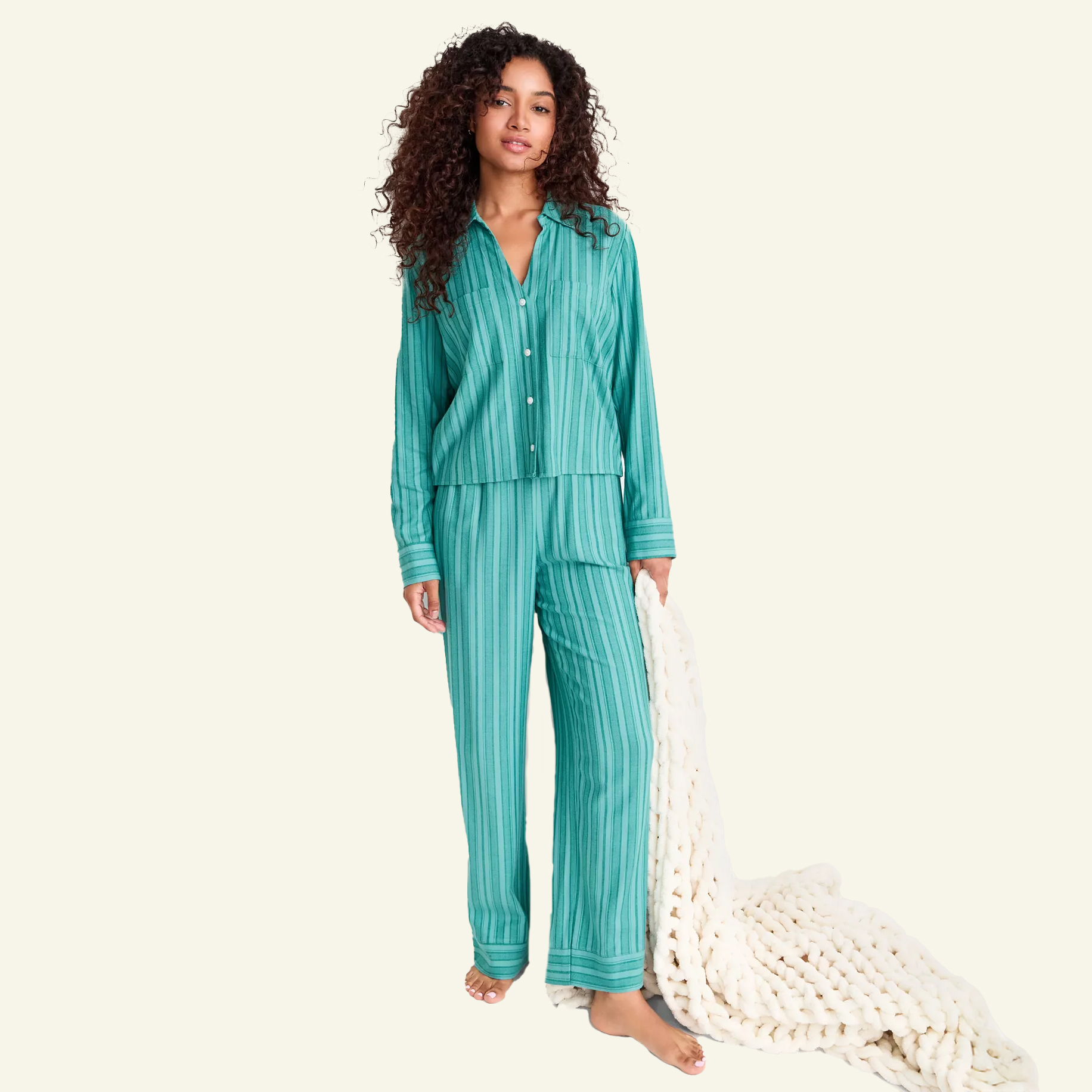 Woman in blue flannel pajama set