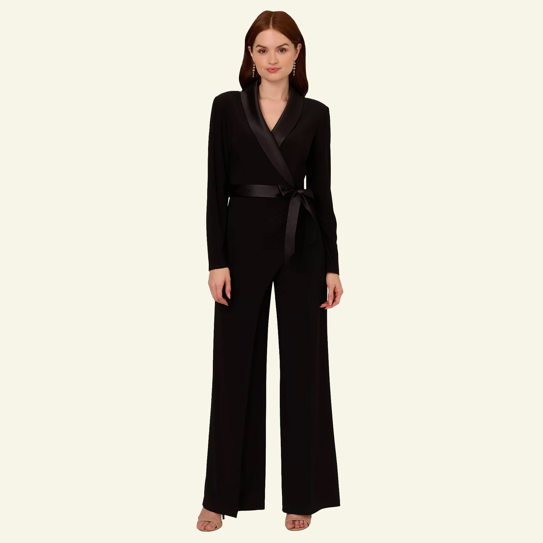 Woman in black long-sleeve tuxedo jumpsuit