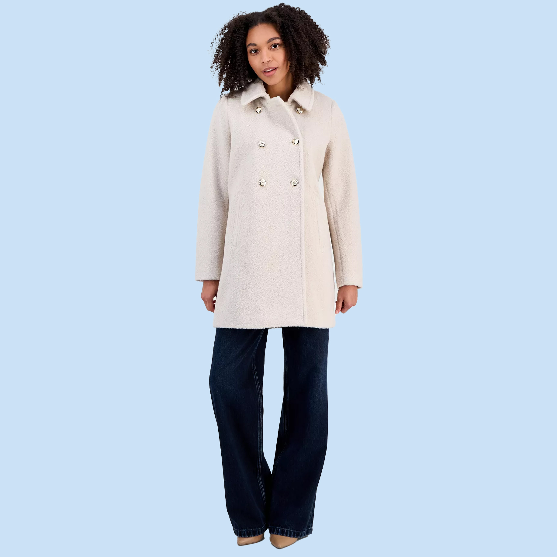 Woman in white peacoat
