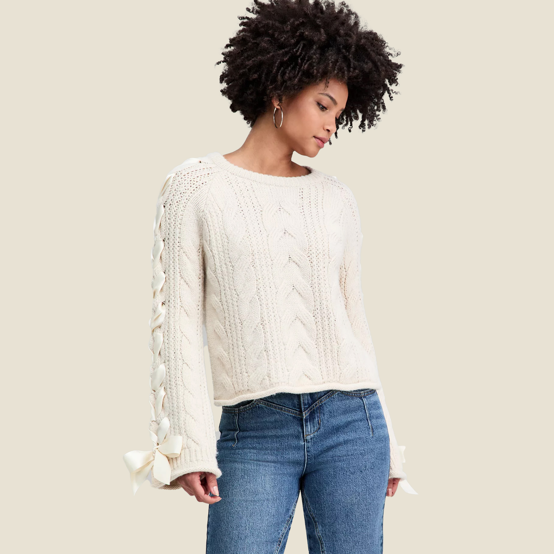 Woman in white bow sweater