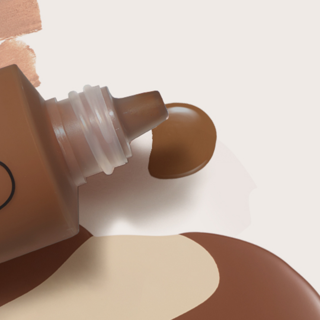 bottle of foundation spilled out