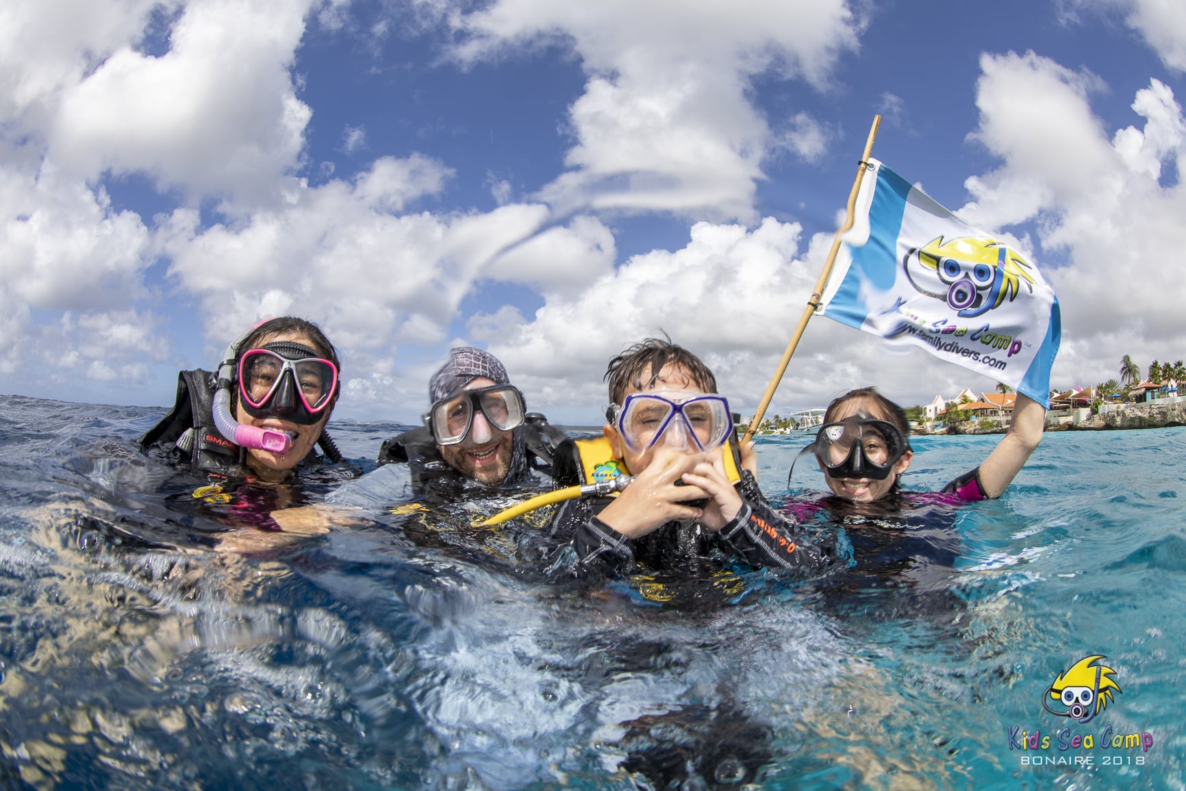 adults on a dive trip with their kids