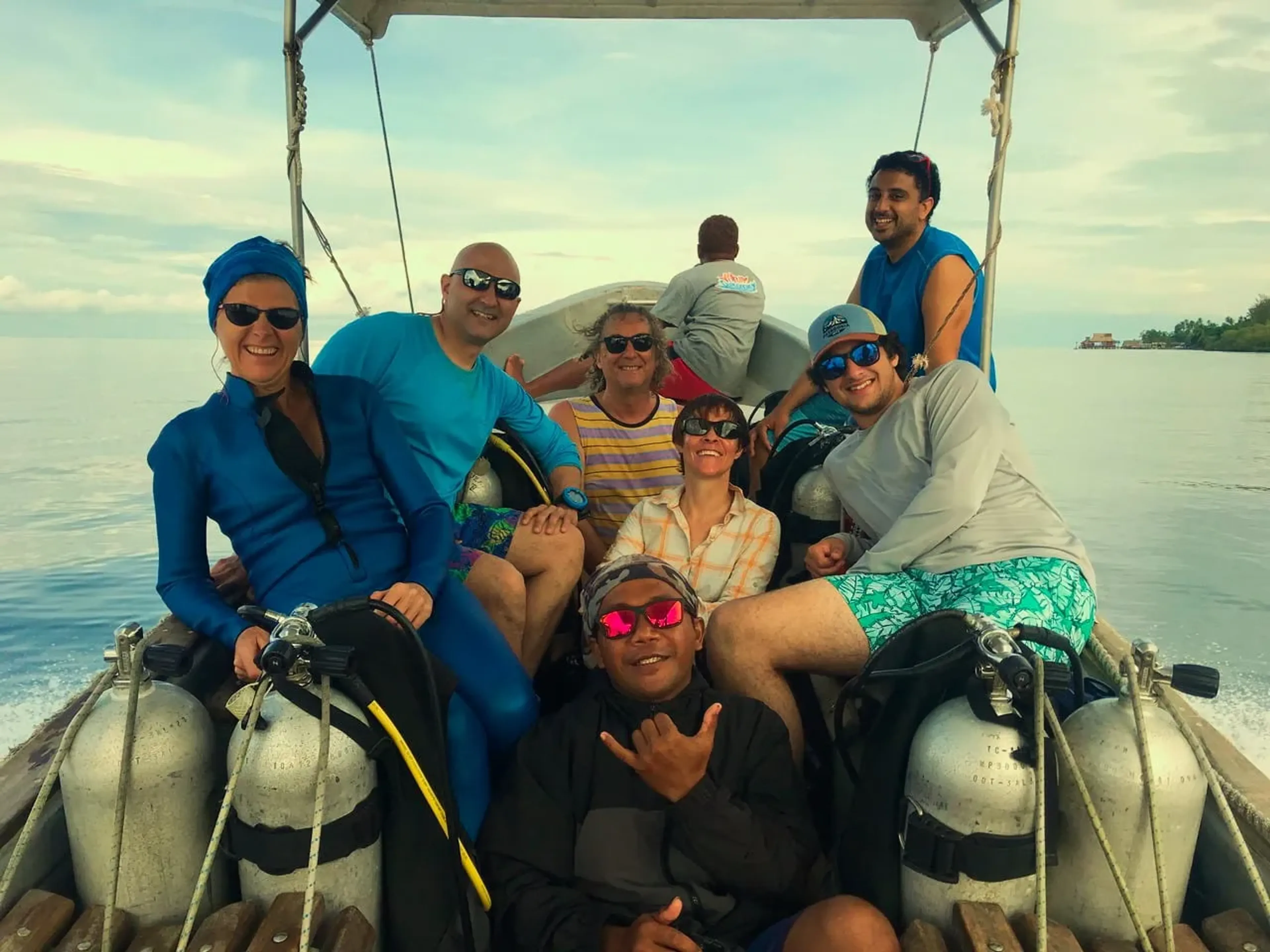 group of scuba divers and snorkelers in raja ampat