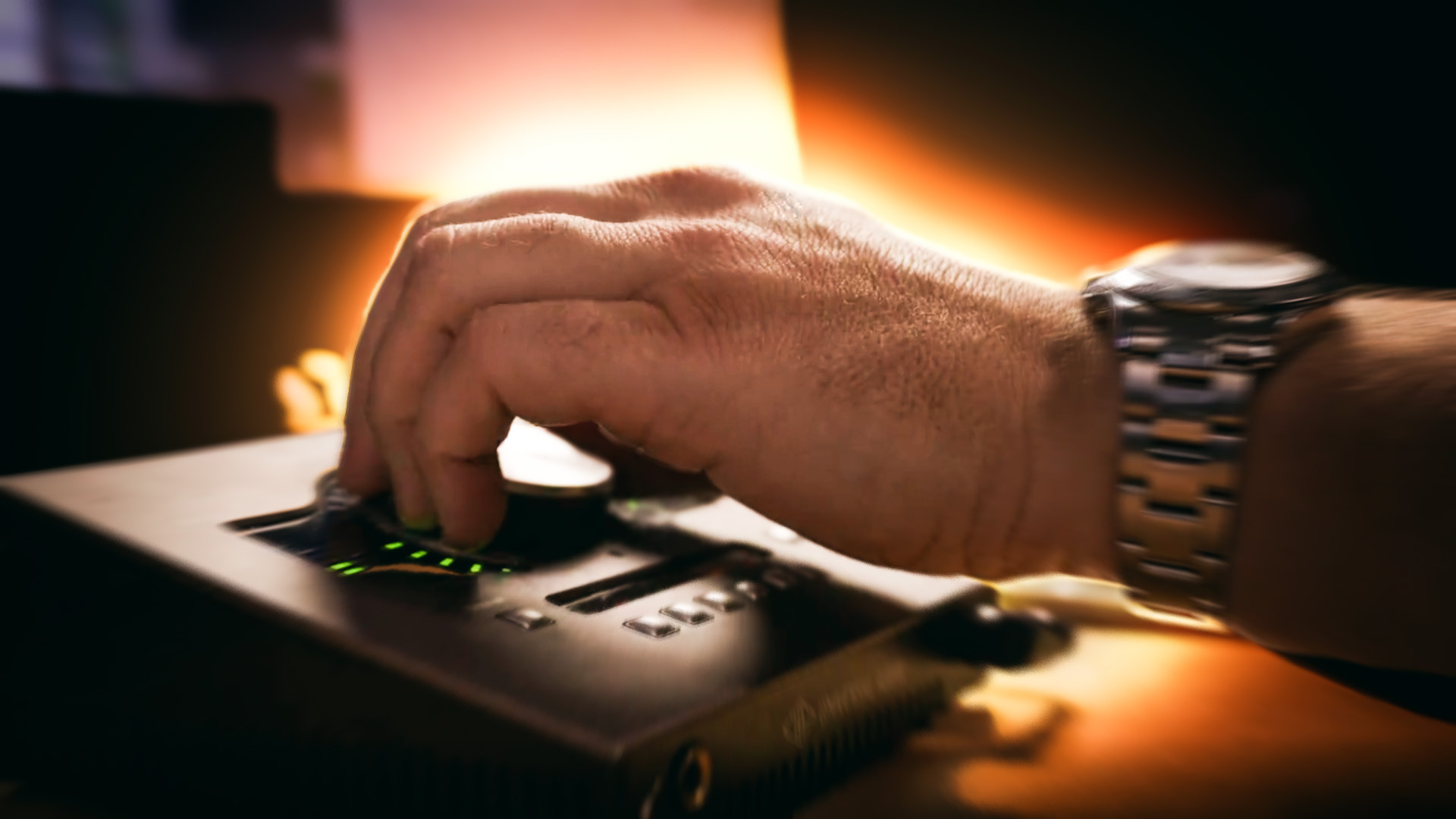 The Art of Controlled Chaos: Andrew Dawson adjusting levels on a studio audio interface during the mix of Phantogram’s “Mister Impossible.”