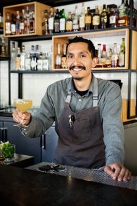 smiling-male-bartender-offering-cocktail-b-side-restaurant-angela-decenzo_20170710_MG_0566.jpg
