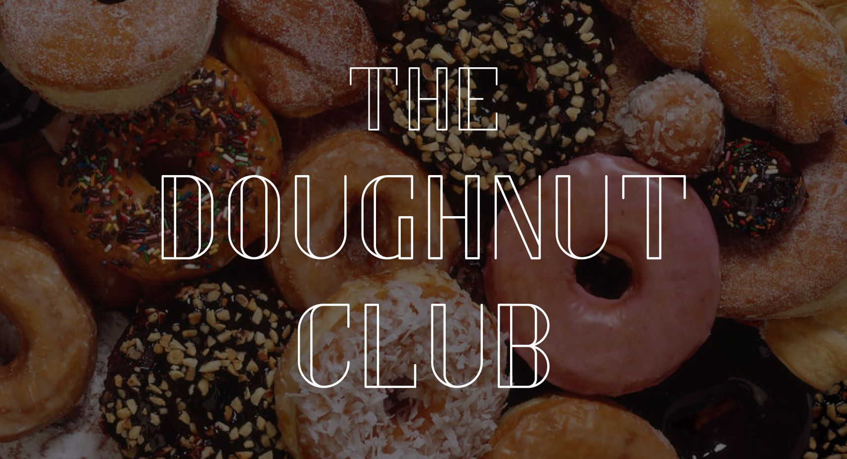 Photo of doughnuts with the words The Doughnut Club written over top